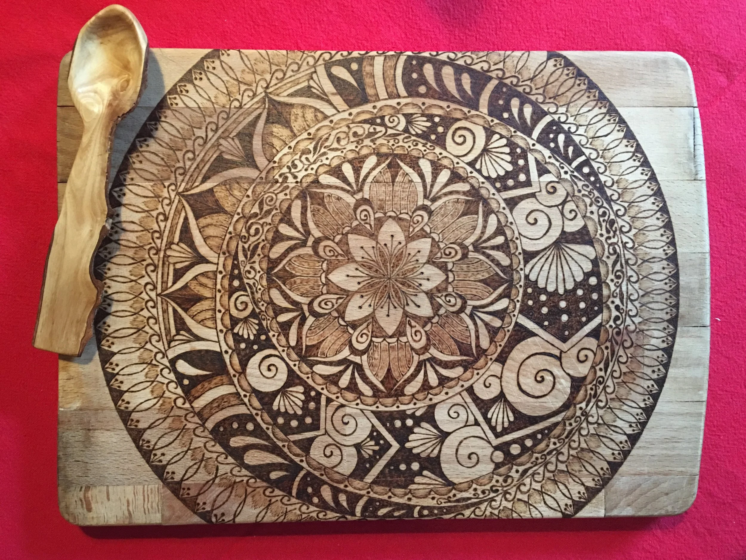 Chopping board and wooden spoon