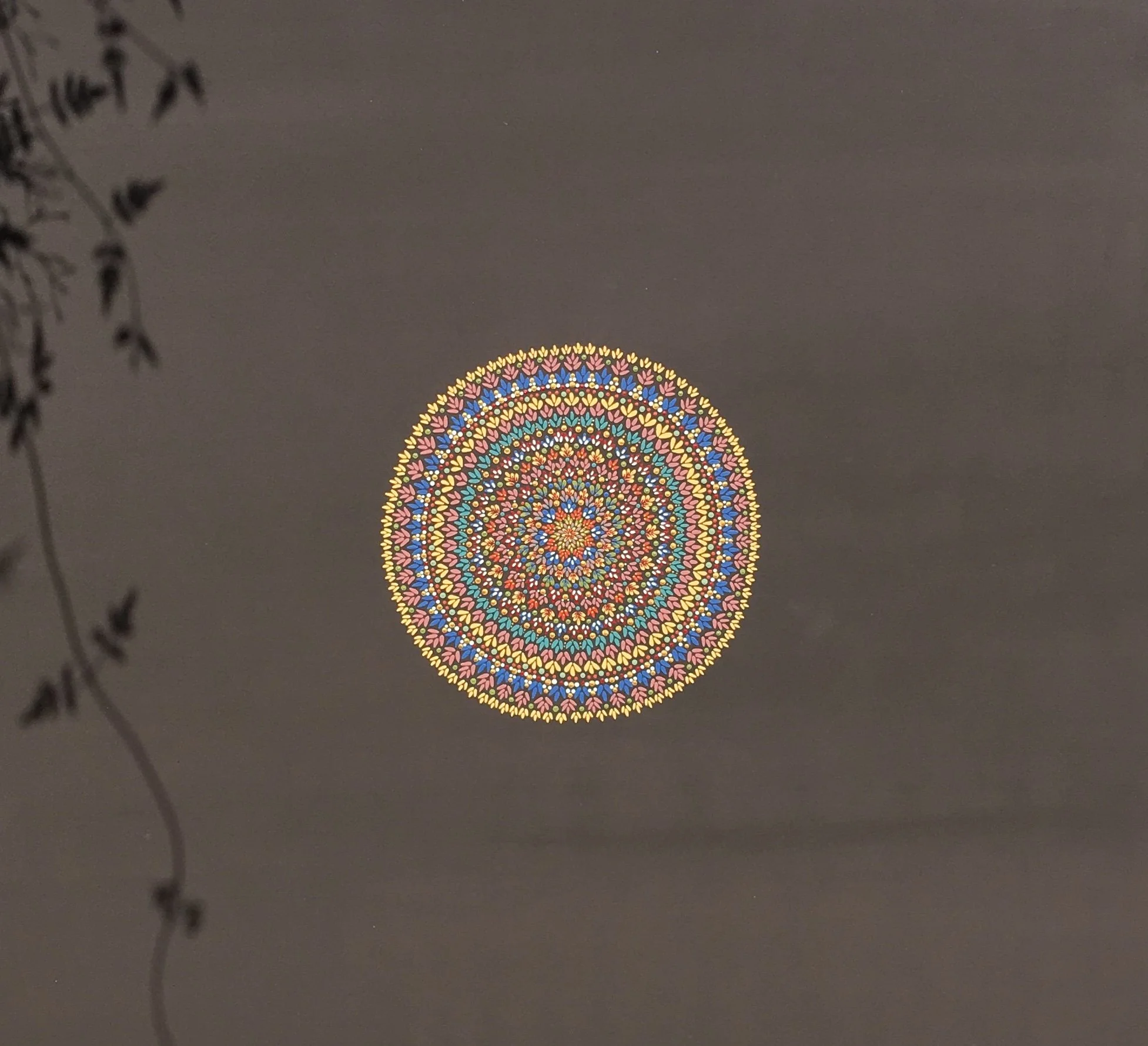 Mandala on a wooden board