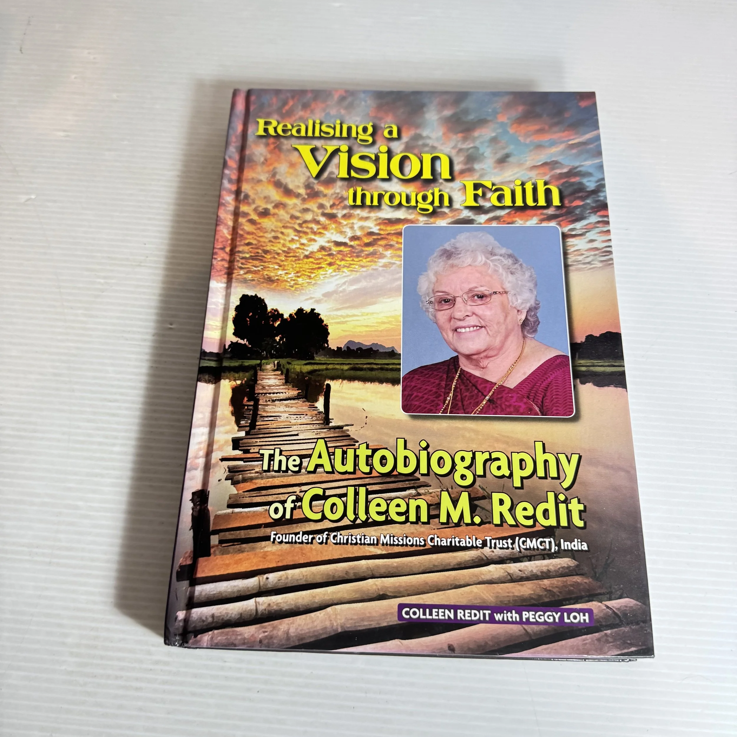 Realising a Vision through Faith : The Autobiography of Colleen M. Redit