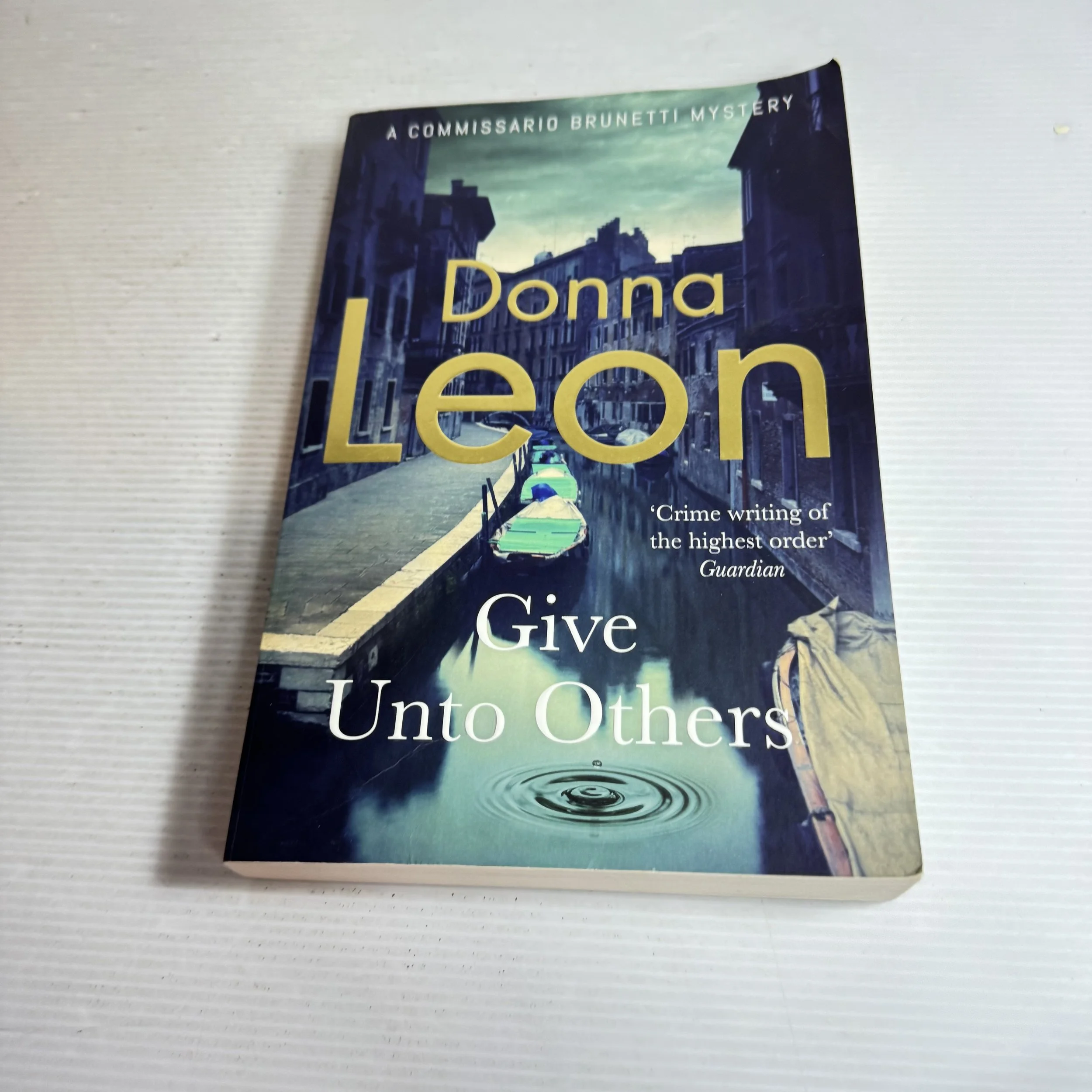 Give Unto Others - Donna Leon