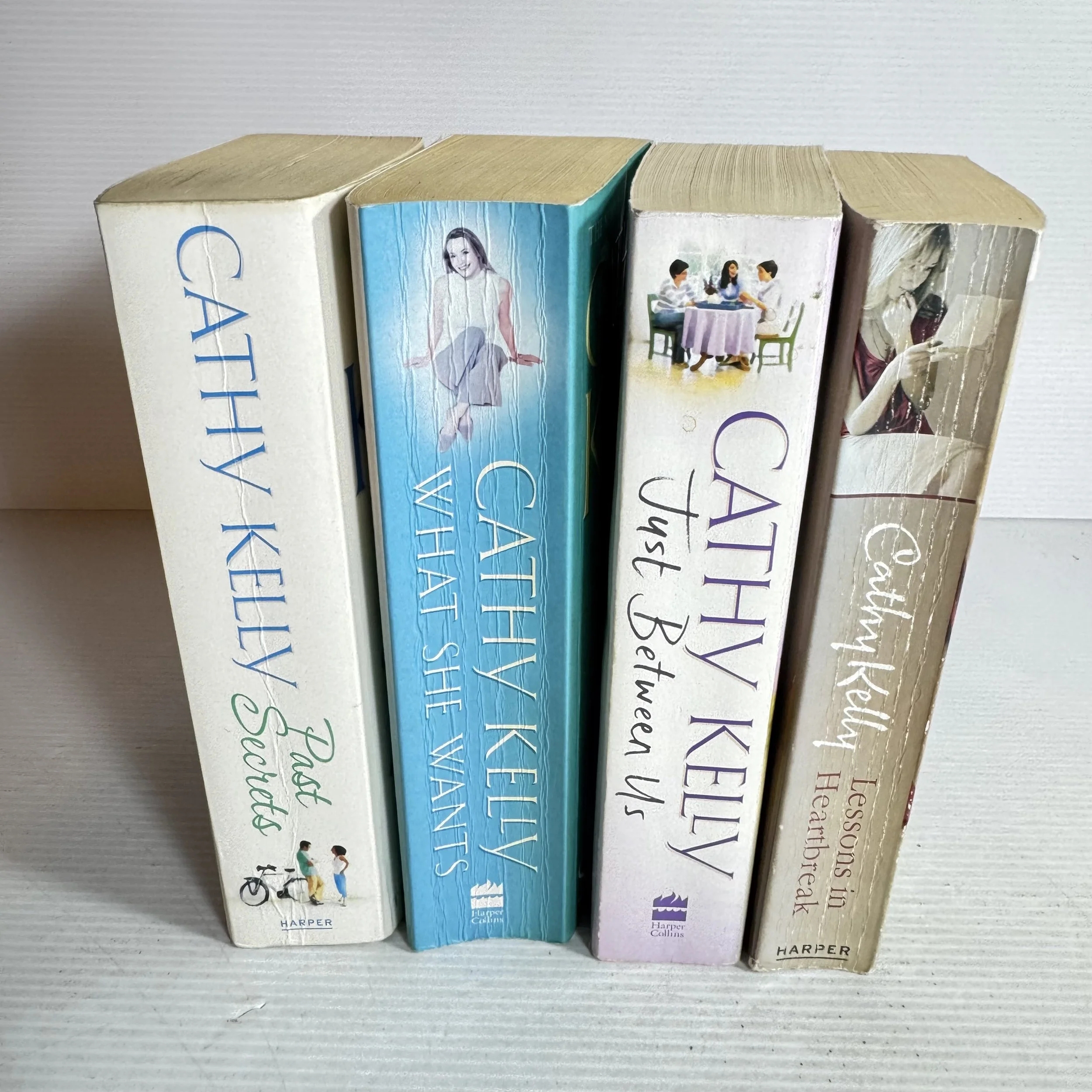 Cathy Kelly Book Bundle x 4 (645) Just Between Us, Lessons in Heartbreak, Past Secrets, What She Wants
