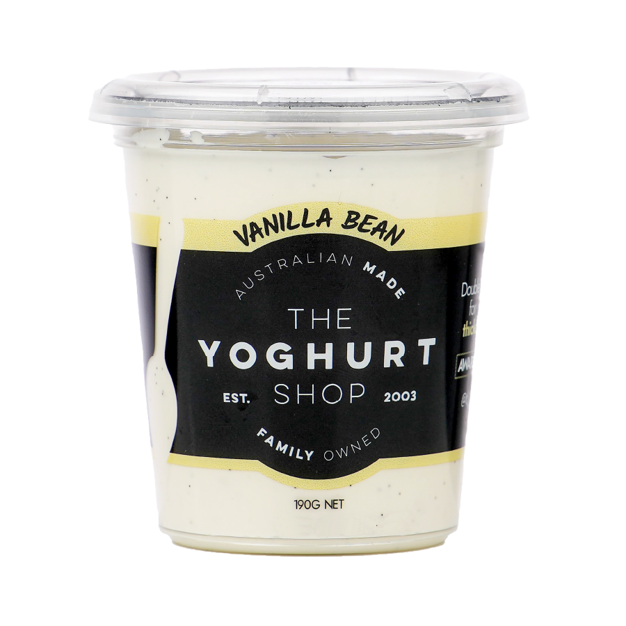 The Yoghurt Shop Vanilla Bean yoghurt 190g tub, showing creamy white yoghurt with visible vanilla specks and the product label. Ready-to-eat snack.