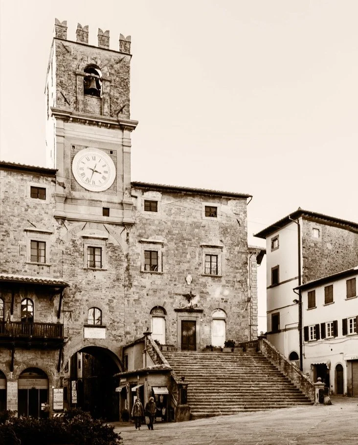 The old clock tower of the Town Hall in the main square (Palazzo Comunale) in Cortona, Tuscany, Italy.
