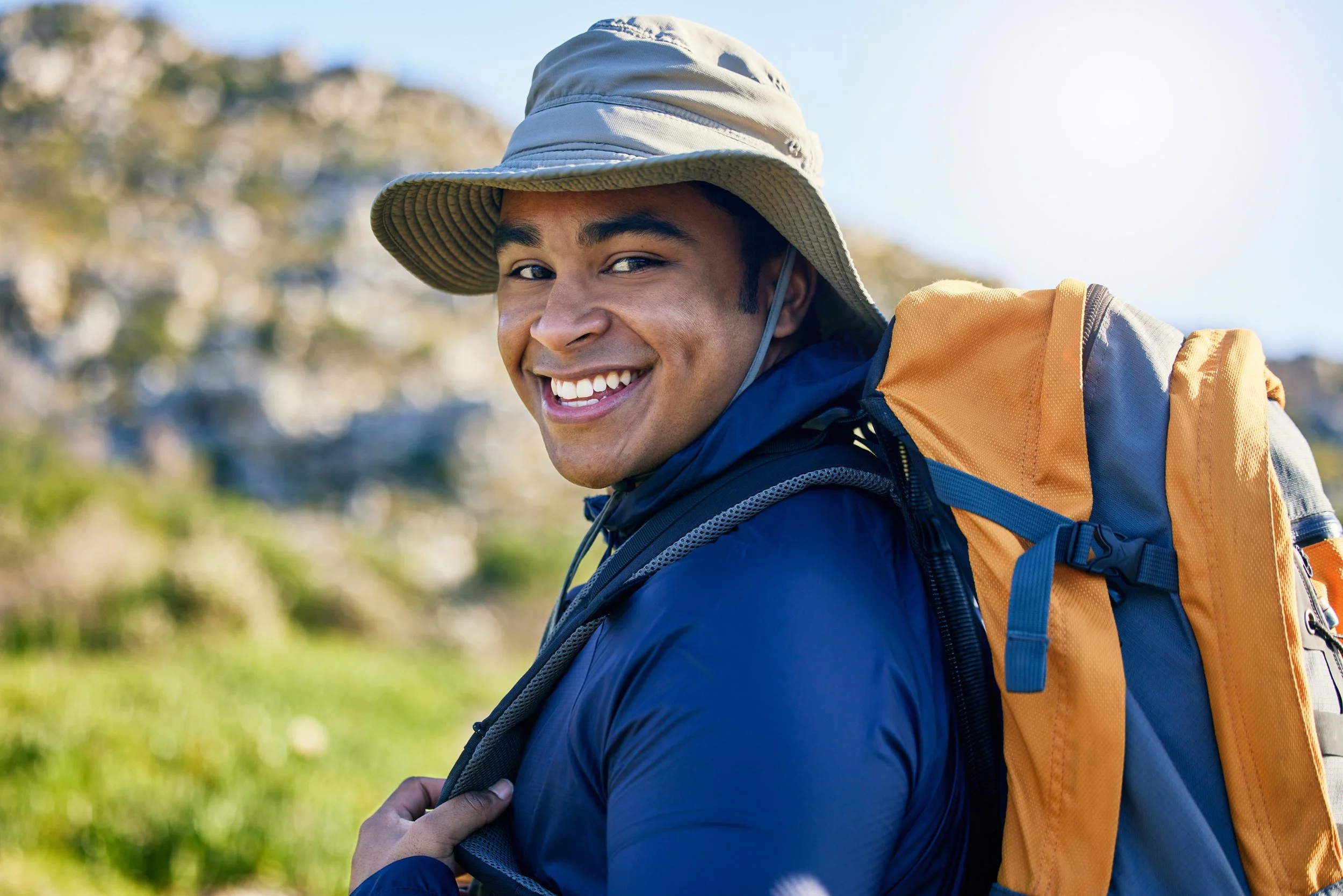 portrait-hiker-or-happy-man-in-nature-walking-on-2025-04-06-04-01-18-utc.jpg
