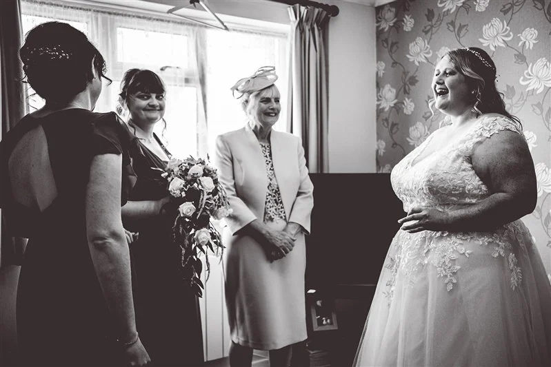 Black & White photo of the bride getting ready at home