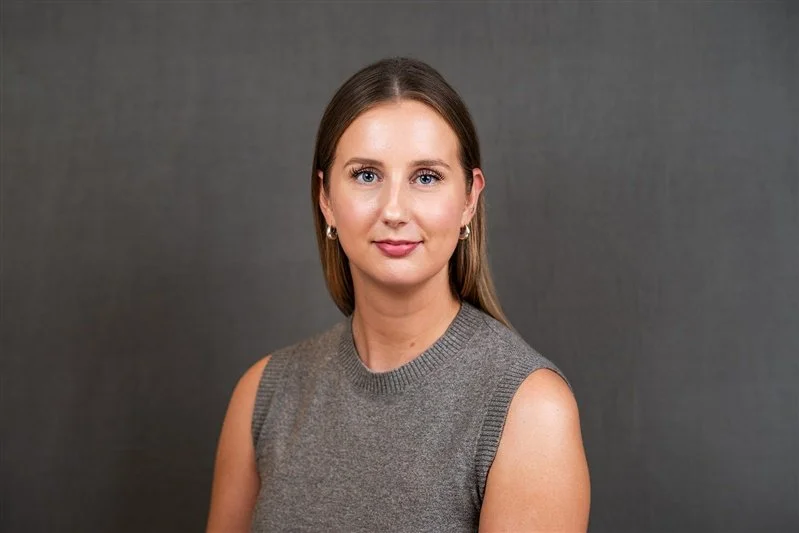 White woman wearing a grey sleeveless top -  London Portrait Photographer Matt Rock
