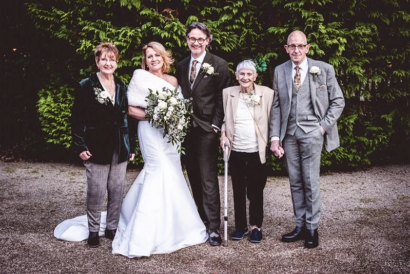 Colour photo of the bride and groom and parents at Hayne House, UK.