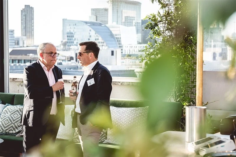 Colour photo of guests talking on top of the Wagtail Rooftop Bar & Restaurant at the  SEC event