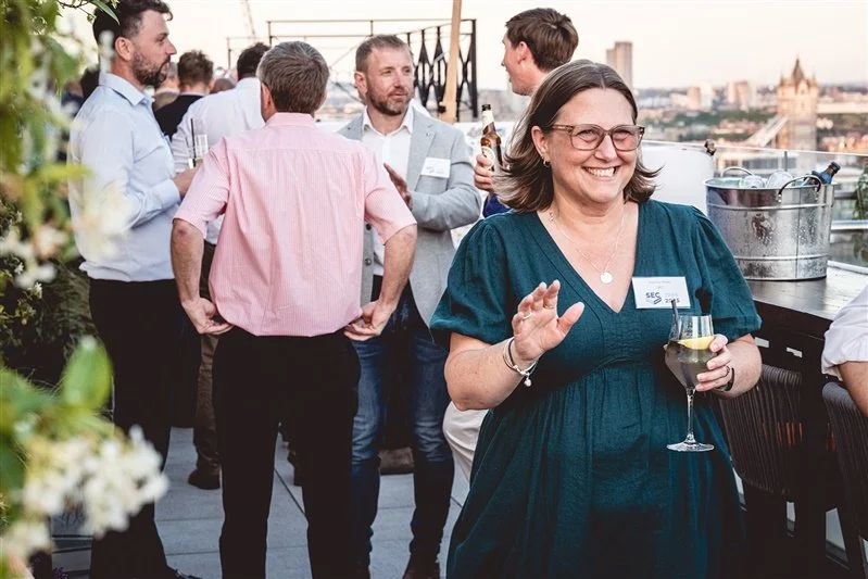 Colour photo on top of the Wagtail Rooftop Bar & Restaurant of guests of SEC