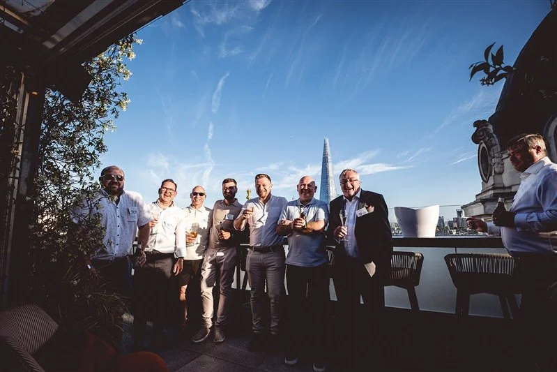 Colour photo on top of the Wagtail Rooftop Bar & Restaurant of guests of SEC