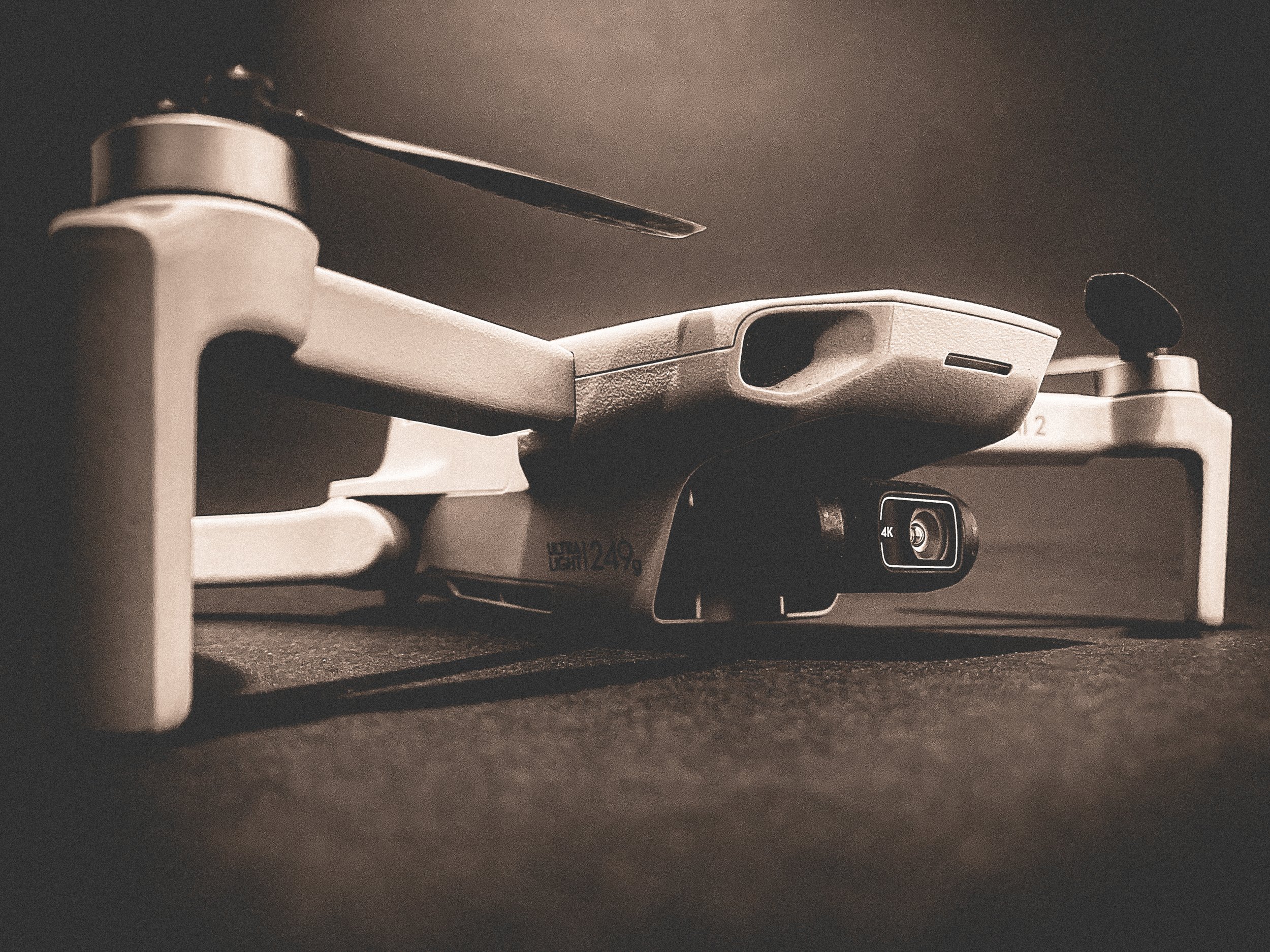 Photo of my DJI drone with black background.