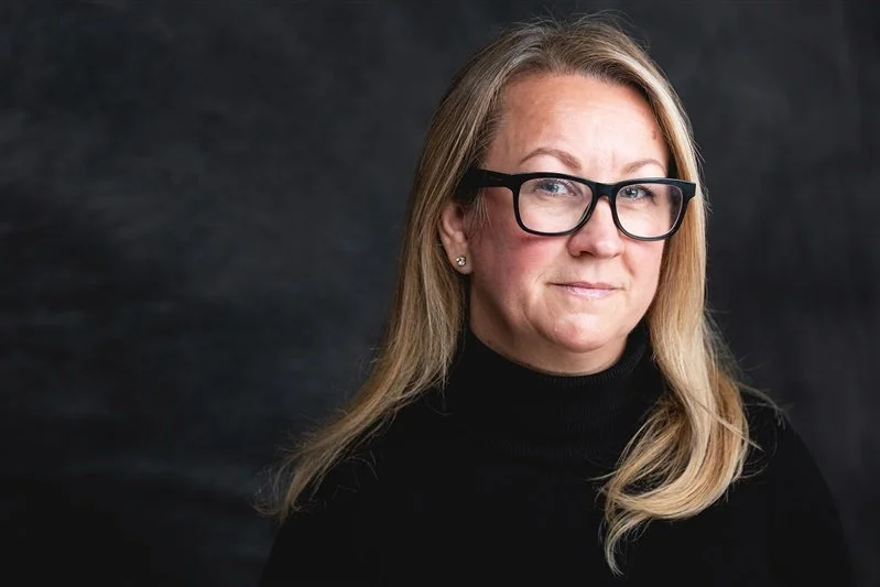 White woman wearing black roll neck jumper - London Portrait Photographer Matt Rock