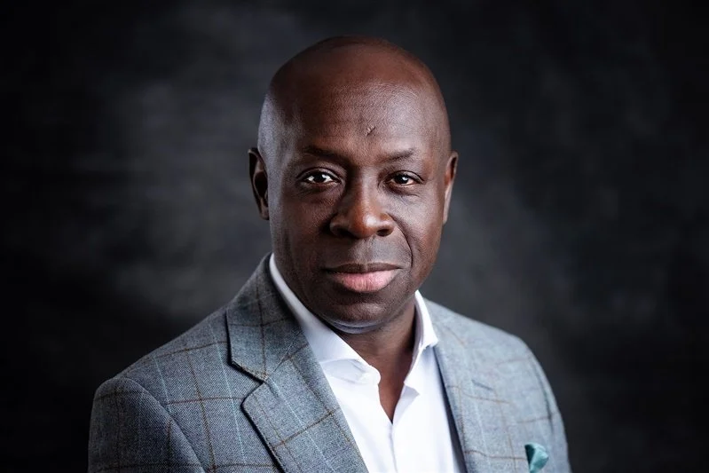 Black man wearing smart suit and white shirt - London Portrait Photographer Matt Rock