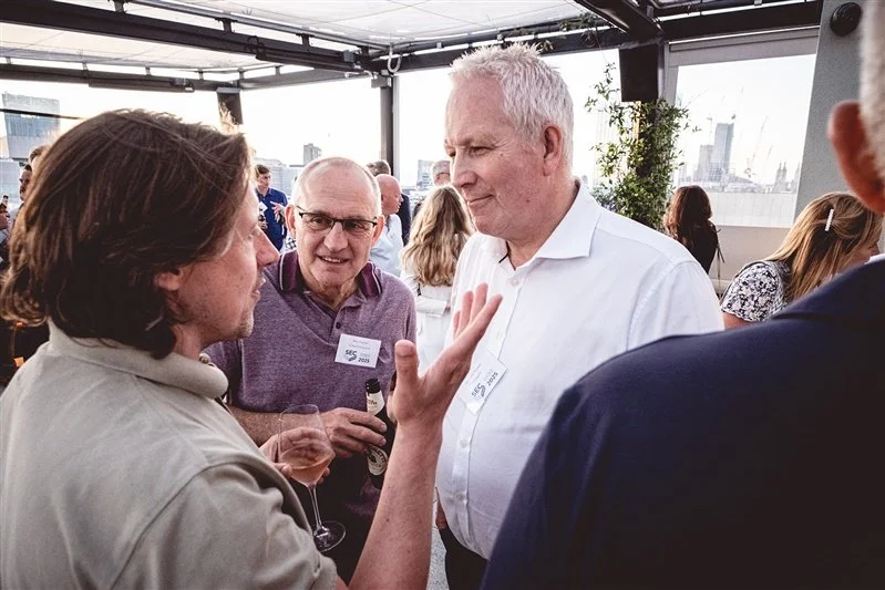 Colour photo on top of the Wagtail Rooftop Bar & Restaurant of guests of SEC
