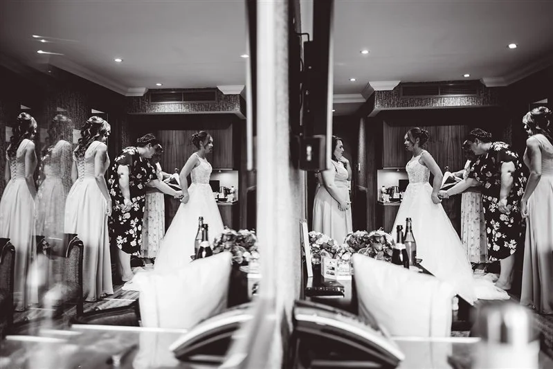 Black & White photo of Bride getting ready at The Donnington Hotel - Kent
