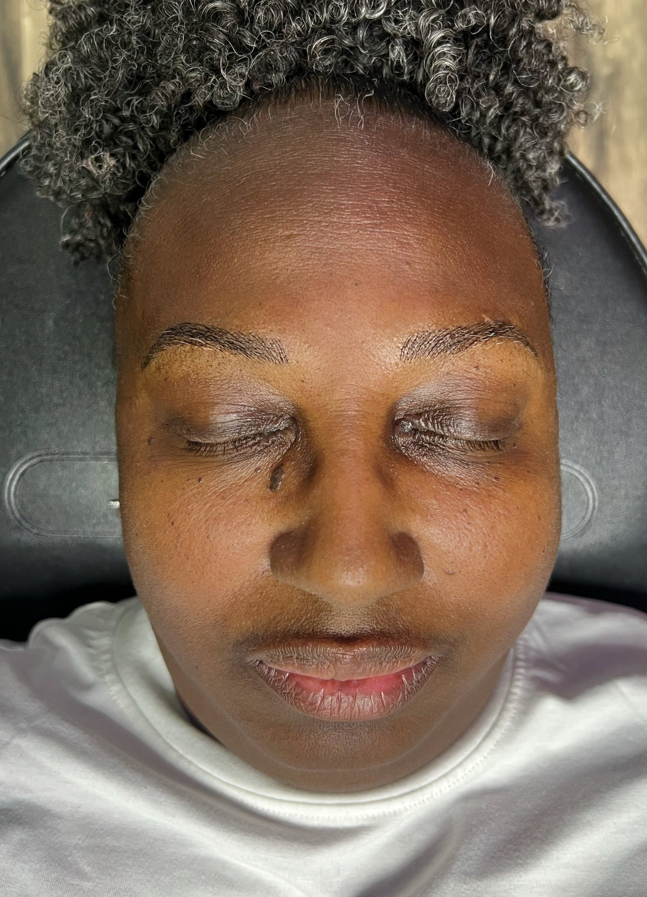 Microblading on dark skin, no grey fade, no ashiness, just soft enhancement.