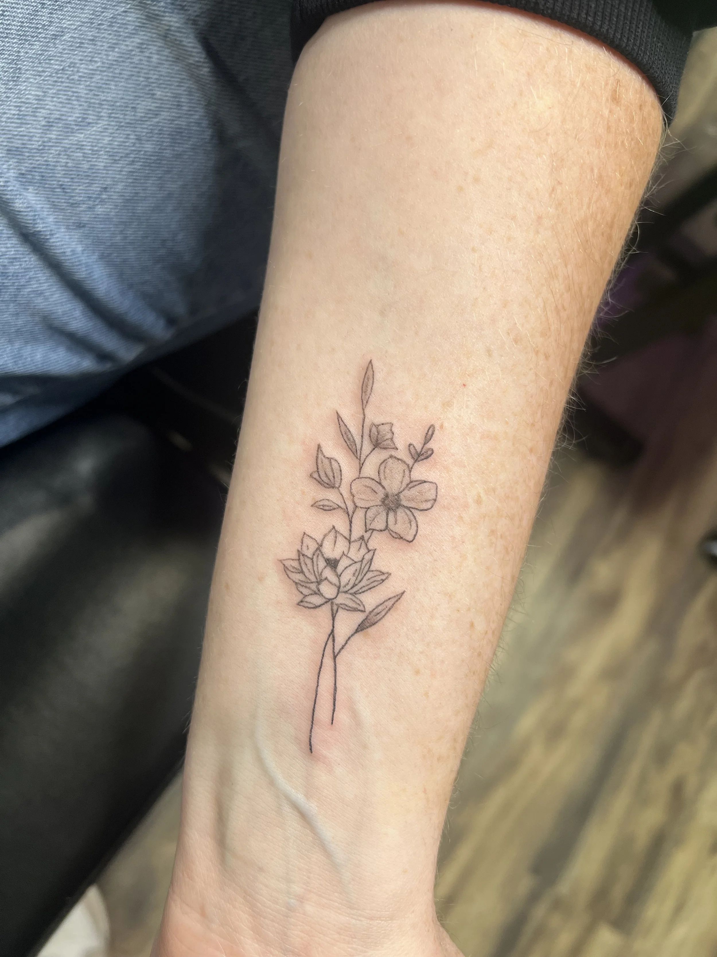 fine line birth flower tattoo, july flower tattoo