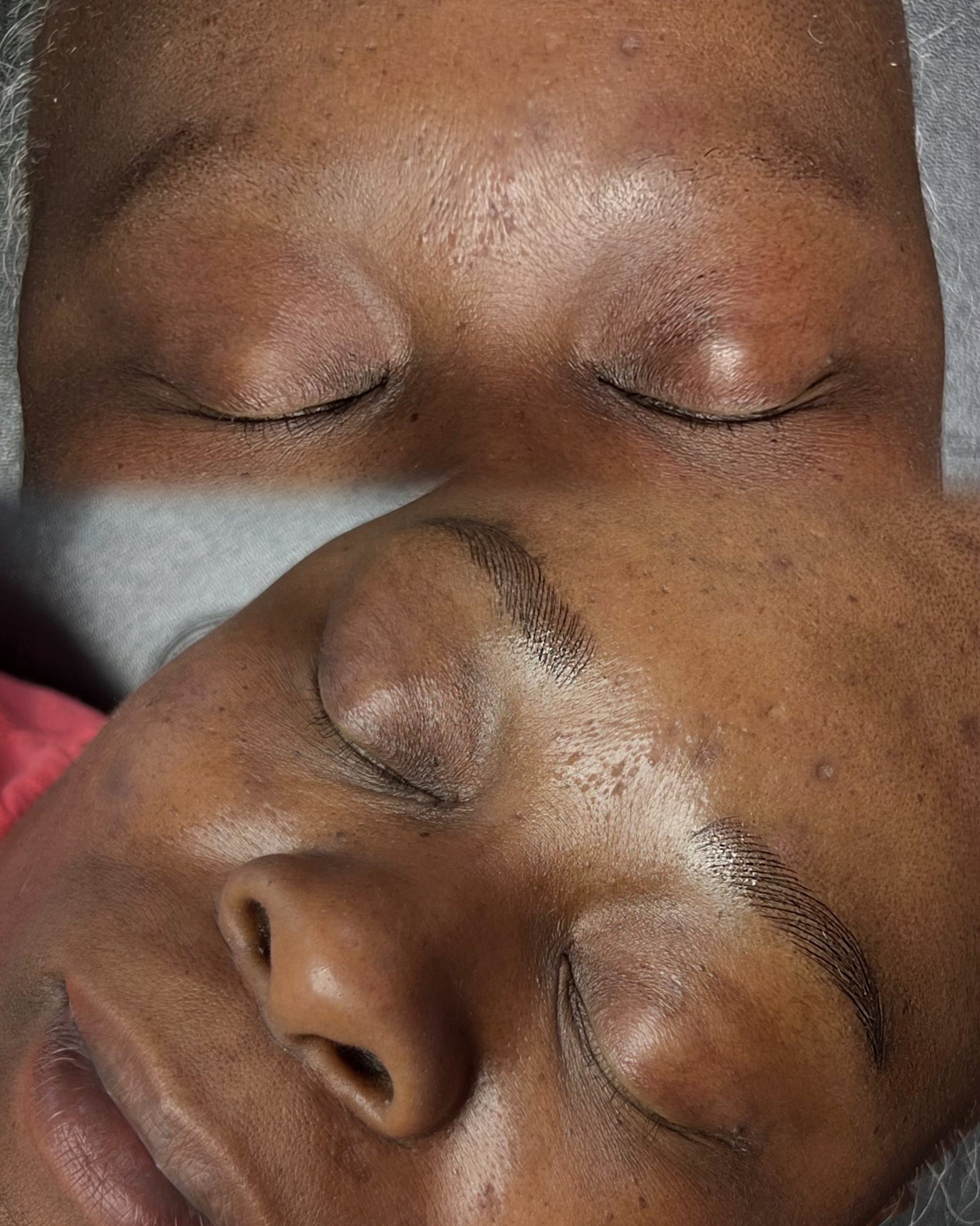 Custom-blended pigment and a technique tailored for melanin-rich skin.