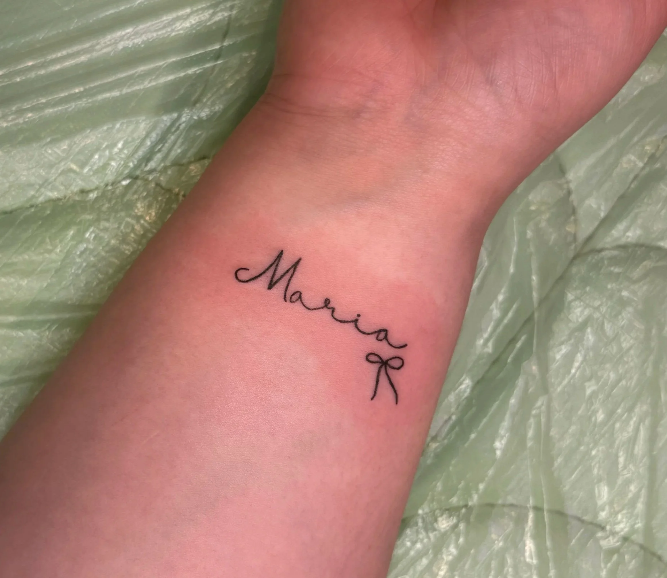 name tattoo, fine line name tattoo