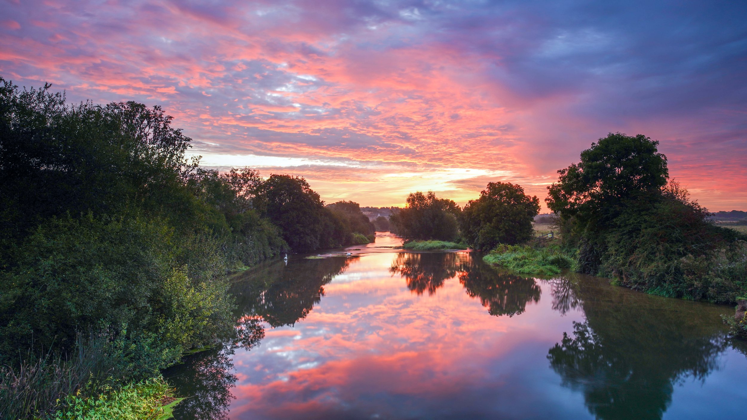 Pink explosion over river stour at Eye bridge