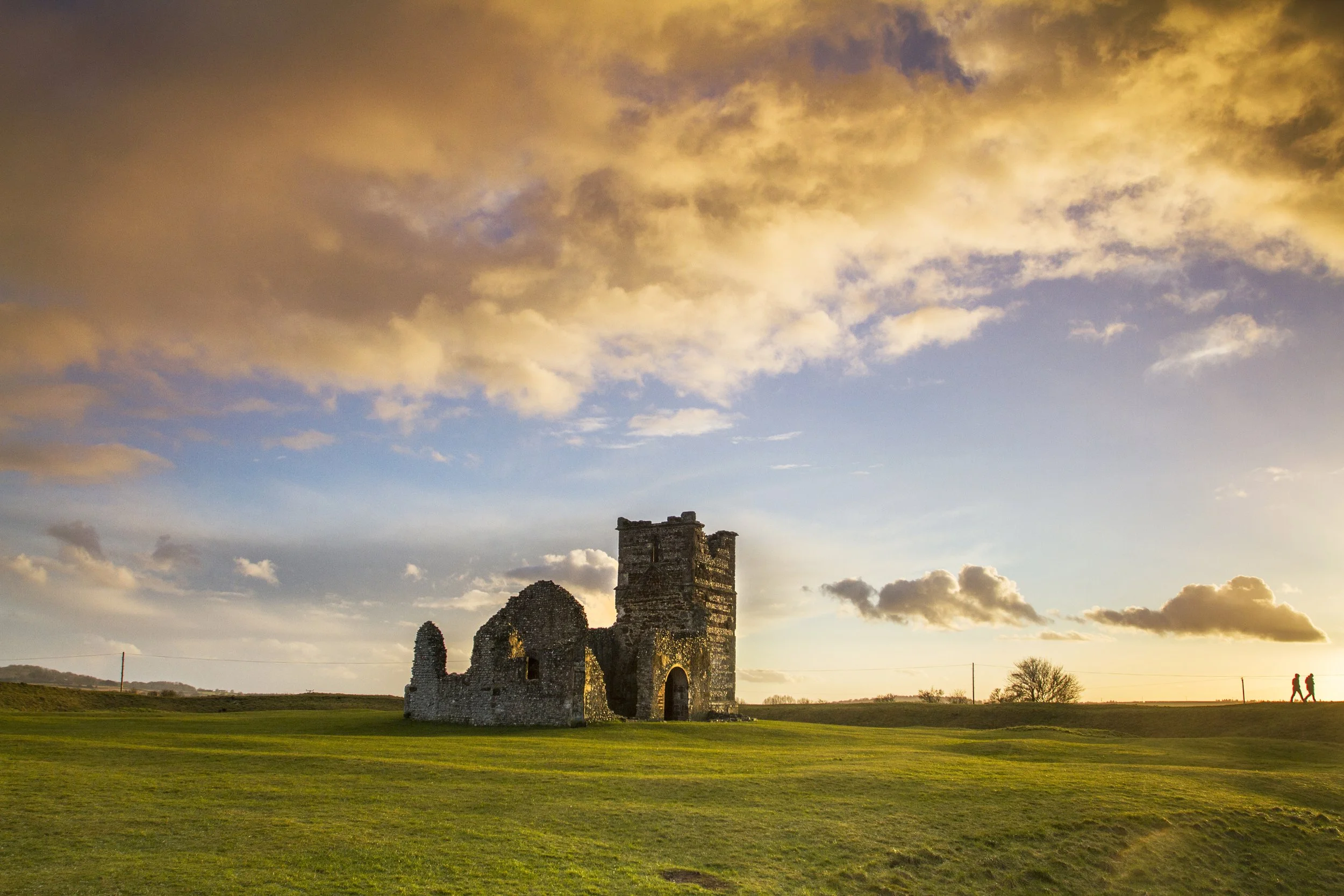 Fiery clouds sunset at Knowlton church