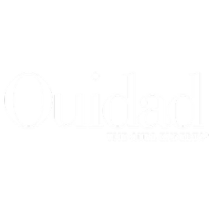 Logo featuring the word 'Ouidad' in large white text with the tagline 'THE CURL EXPERTS' beneath it. The background is black.