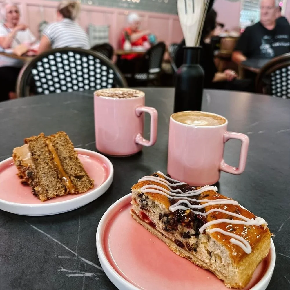 Franks Bakery Cakes and Hot drinks on pink plates and pink mugs