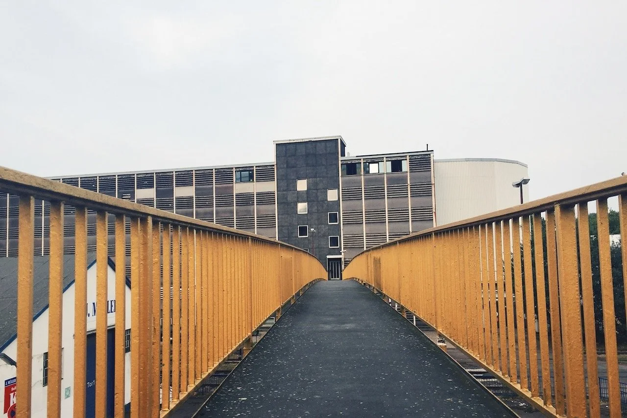 Walking over a yellow bridge in Uberseestadt - Maddie Persent.jpeg