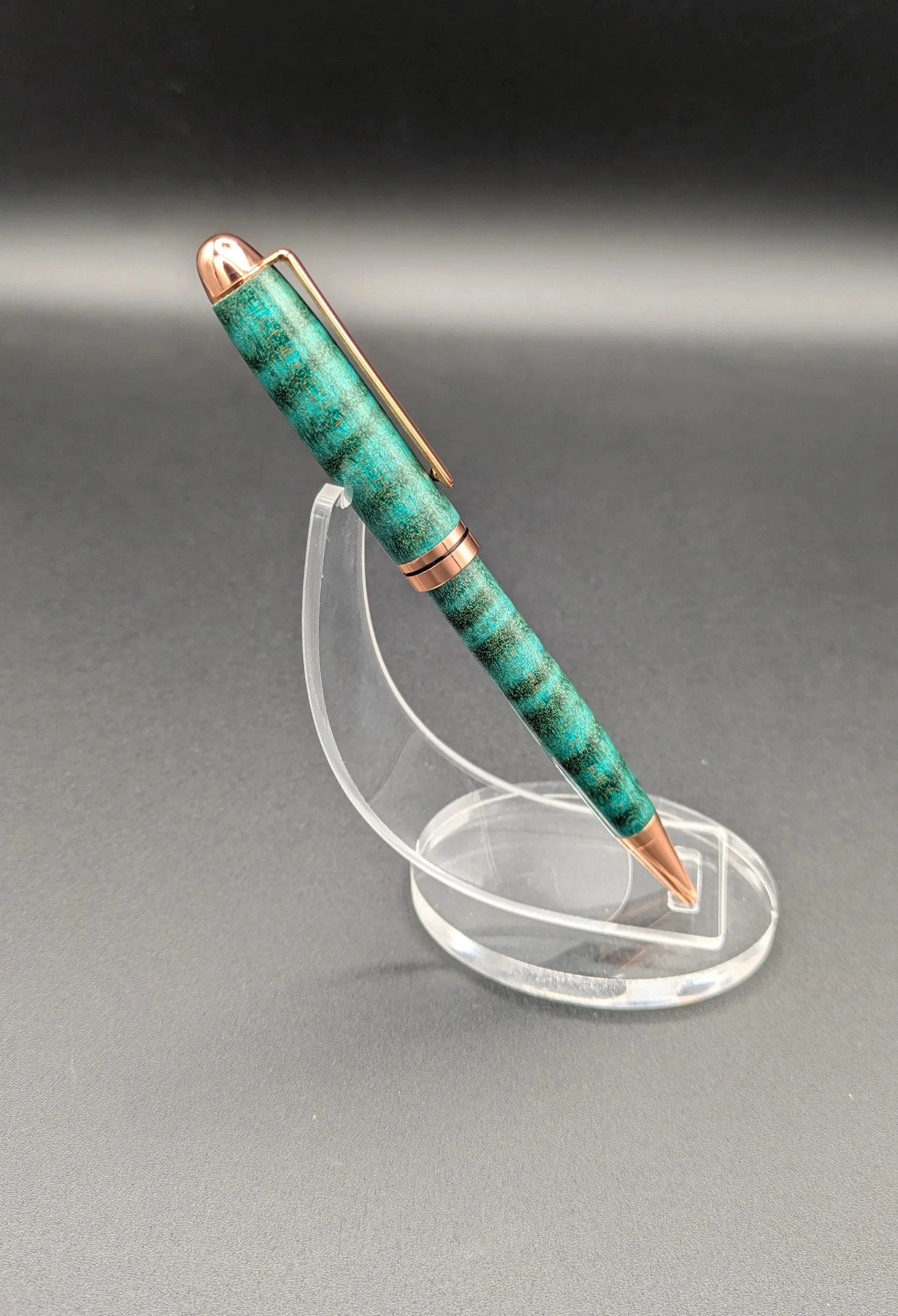 Euro made from Teal Dyed Curly Maple