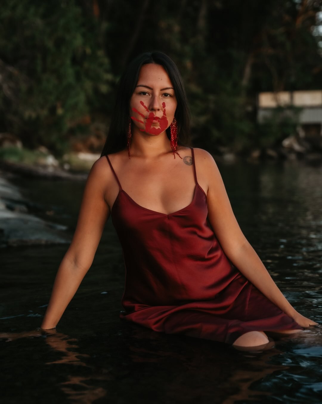 Don&rsquo;t look away. 

This month, at the Regenesiis Prayer and Performance, I stood for these women. Their faces steady in my mind, their names thrumming in my heart. 

Tears burned down my cheeks. Melting this red paint into my heart. 

I stood f