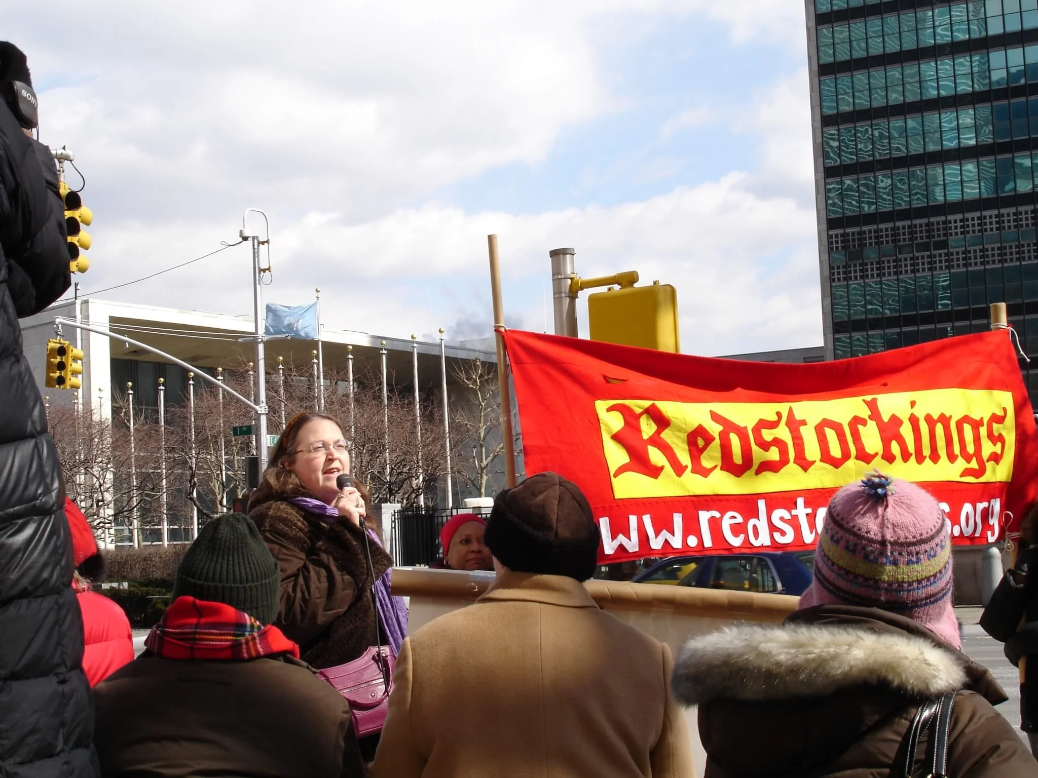 Photo of Redstockings members speakout out in front of the United Nations
