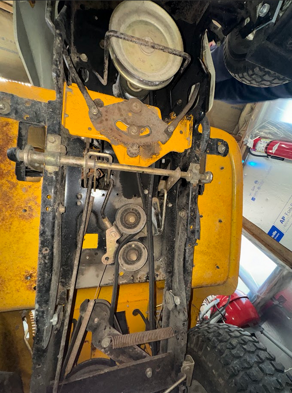 Cub Cadet mower getting a new drive belt installed.