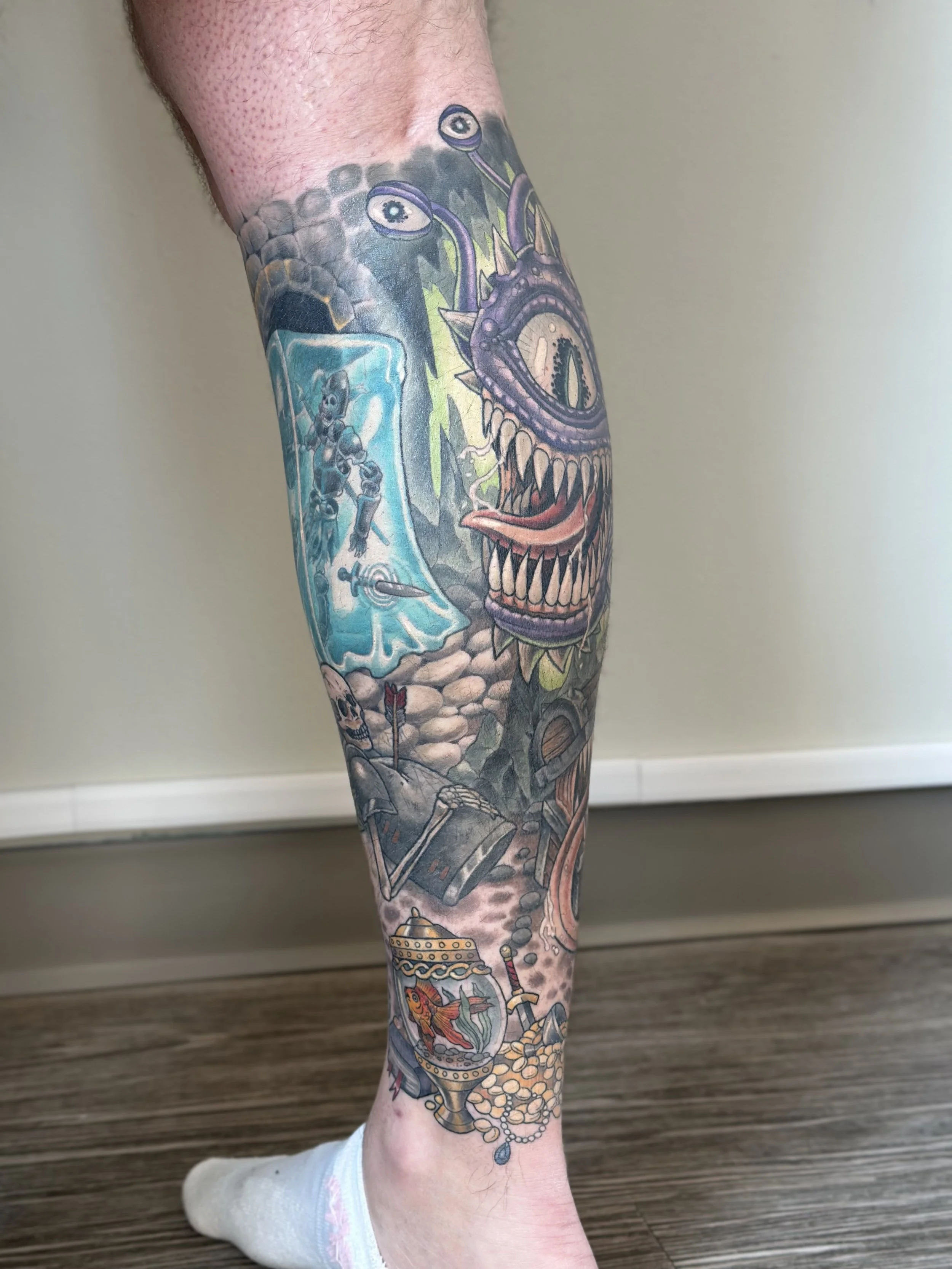 D&D themed calf sleeve. Fully healed and settled.