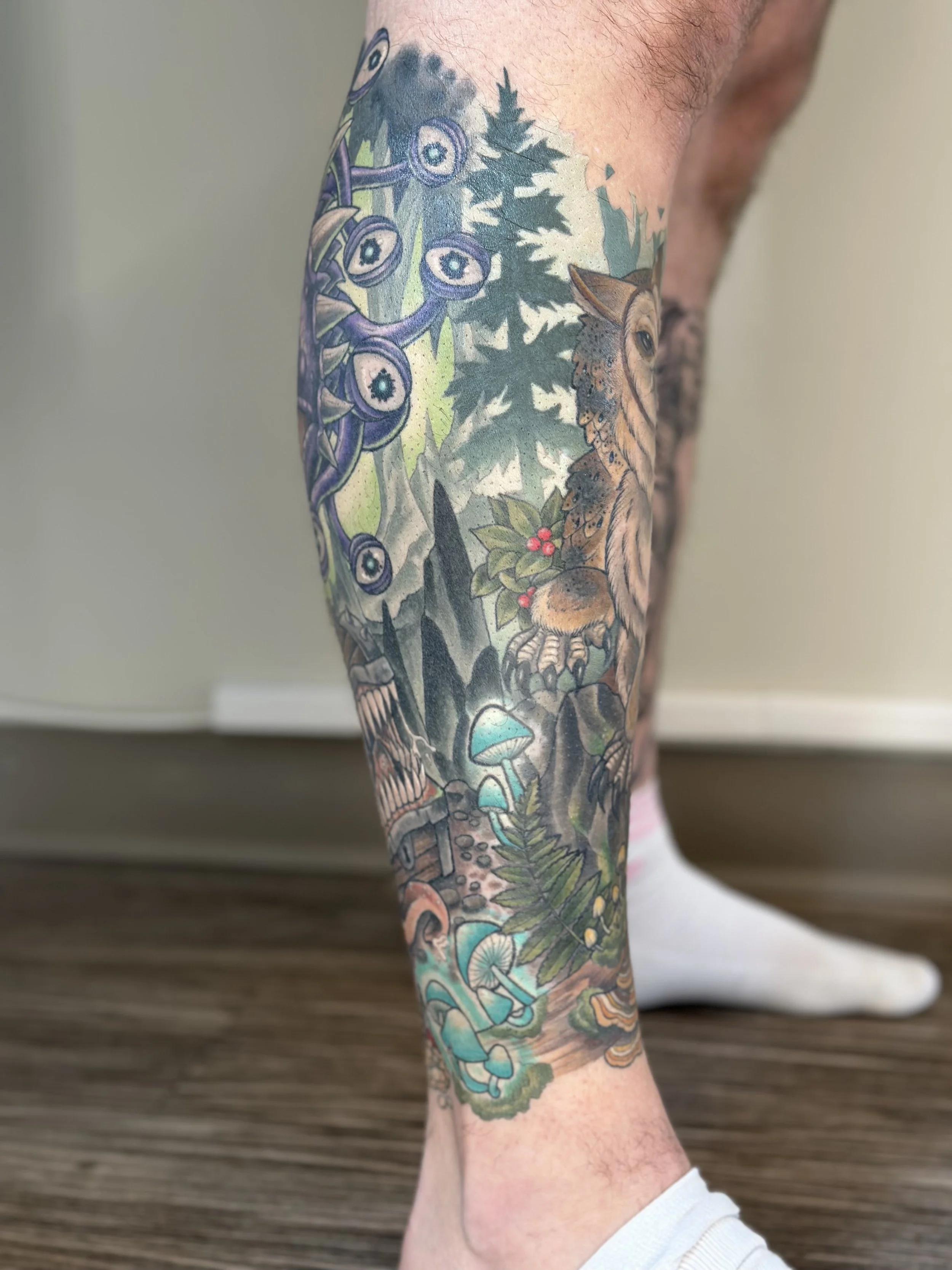 D&D themed calf sleeve. Fully healed and settled.