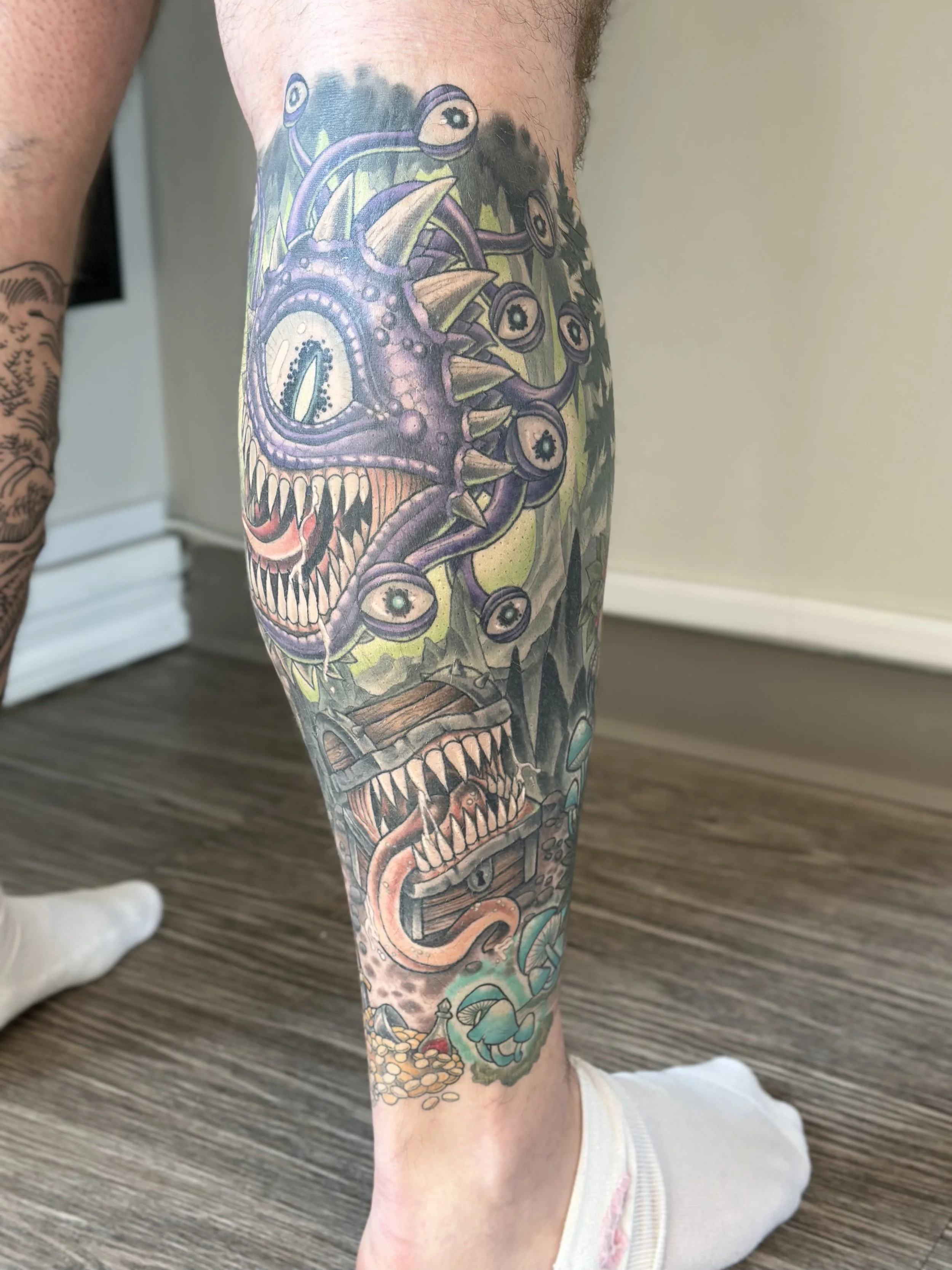 D&D themed calf sleeve. Fully healed and settled.