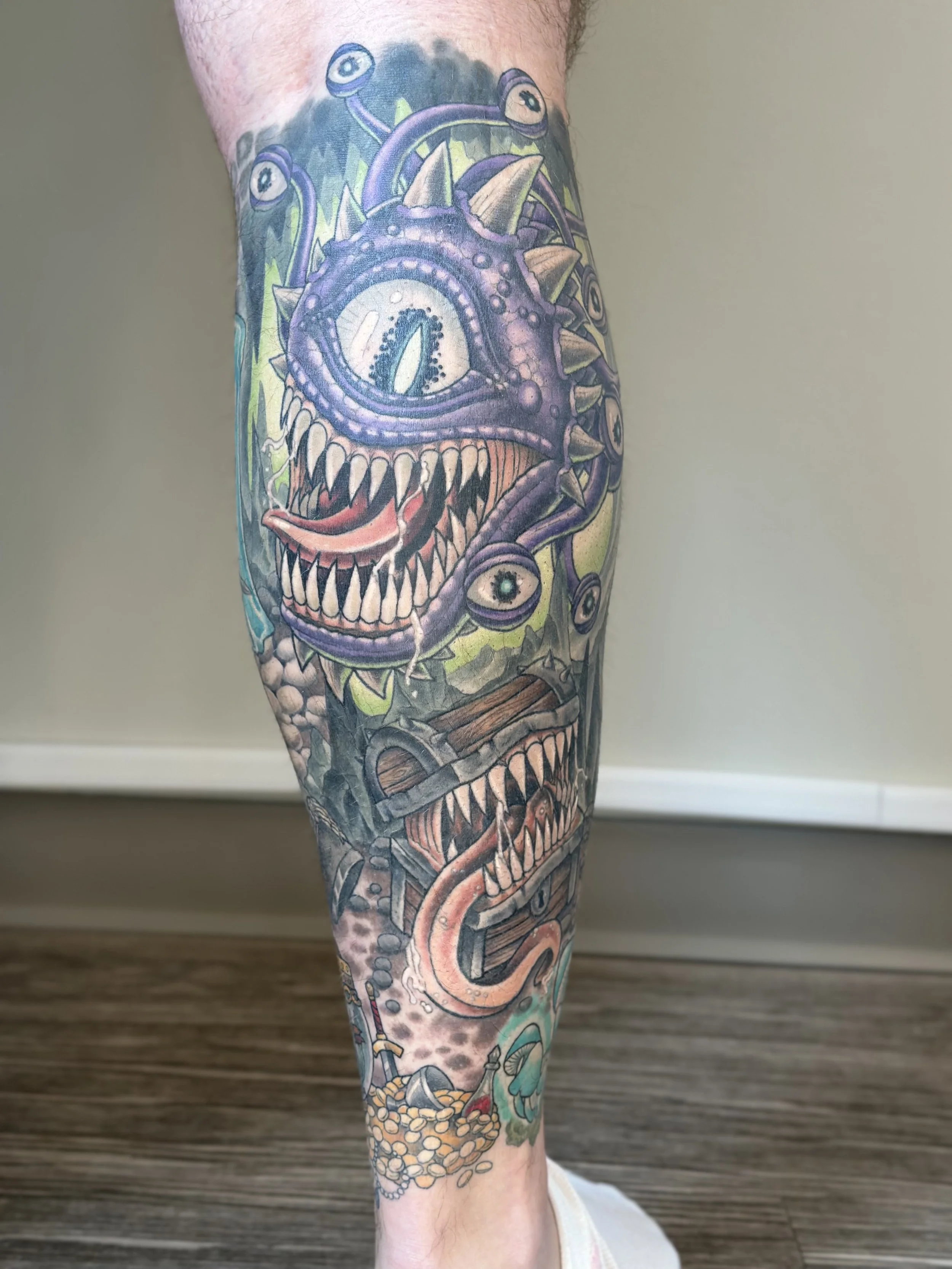 D&D themed calf sleeve. Fully healed and settled.