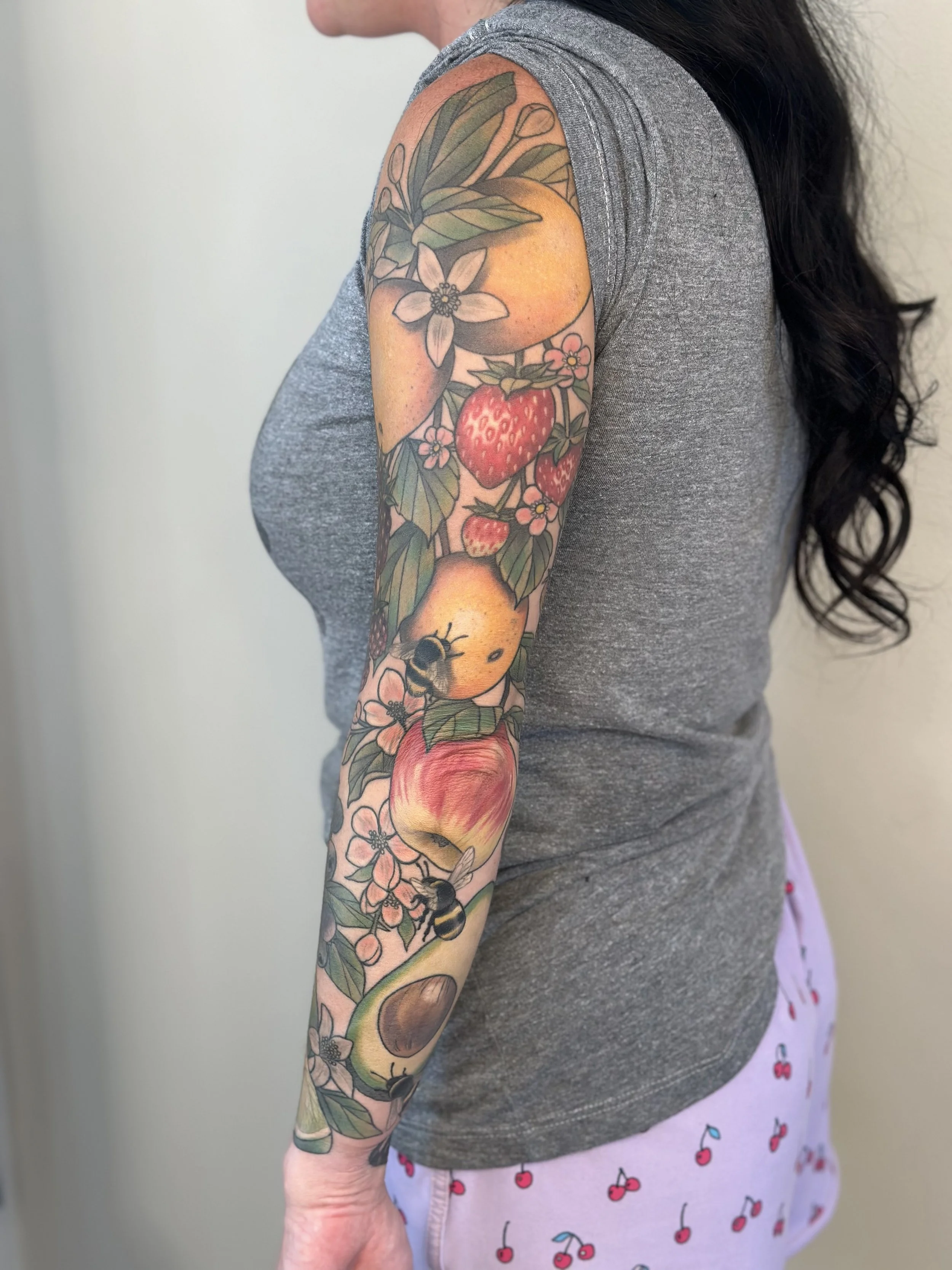 Fruit Sleeve. Pieces on inner forearm are reworks of pieces by another artist. Fully healed and settled.