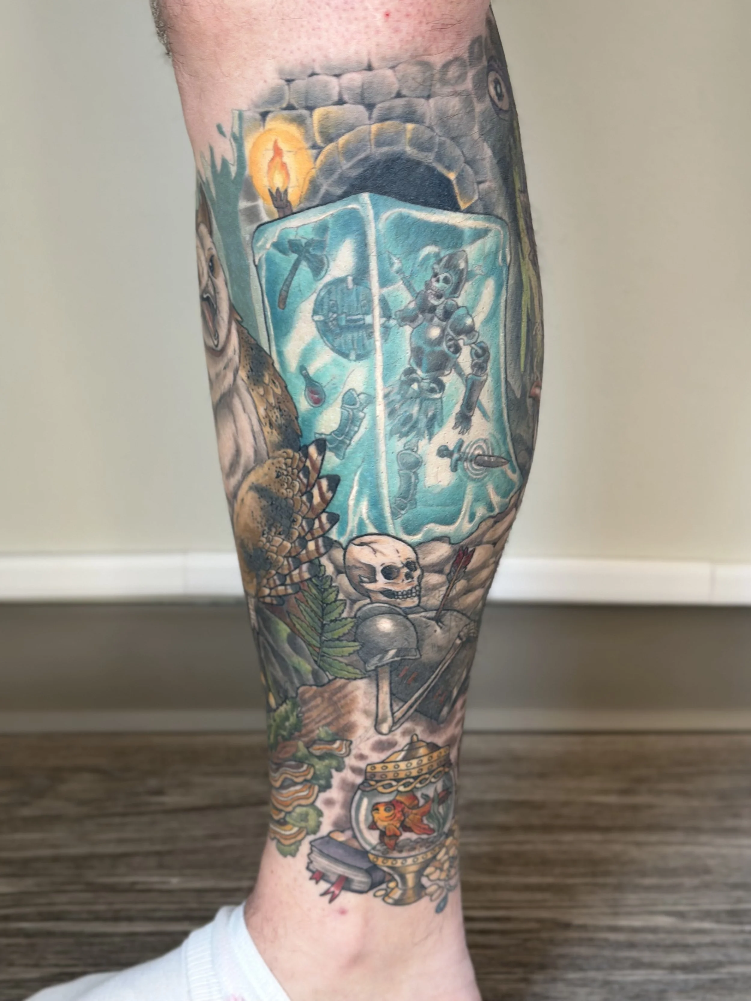 D&D themed calf sleeve. Fully healed and settled.