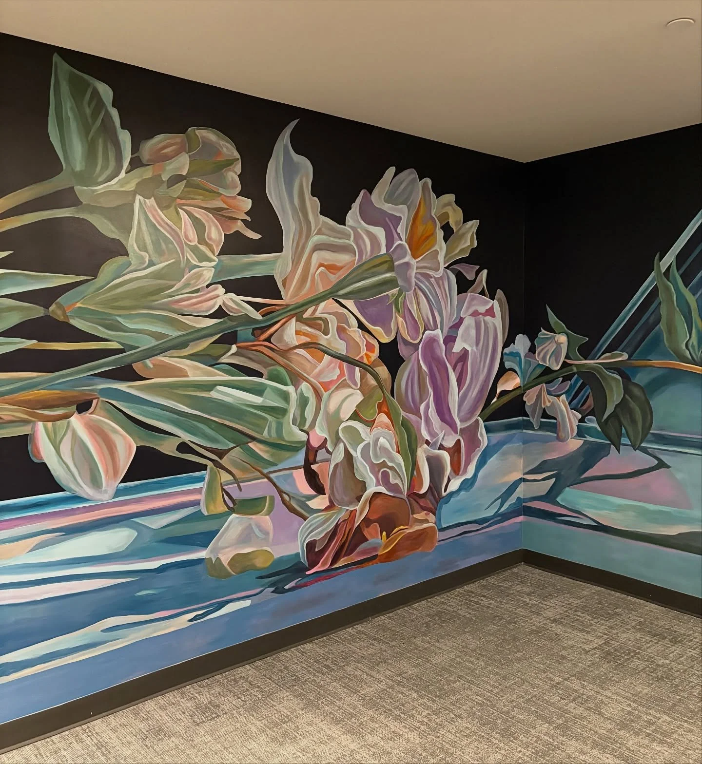 3rd floor lobby at @joulehouse  @wxll.space , Wynwood 🌸
Inspired by an old Lincoln Town Car near my studio &mdash; overgrown with grass and scattered with fallen flowers. I was drawn to the quiet contrast of metal and bloom, how softness can settle 