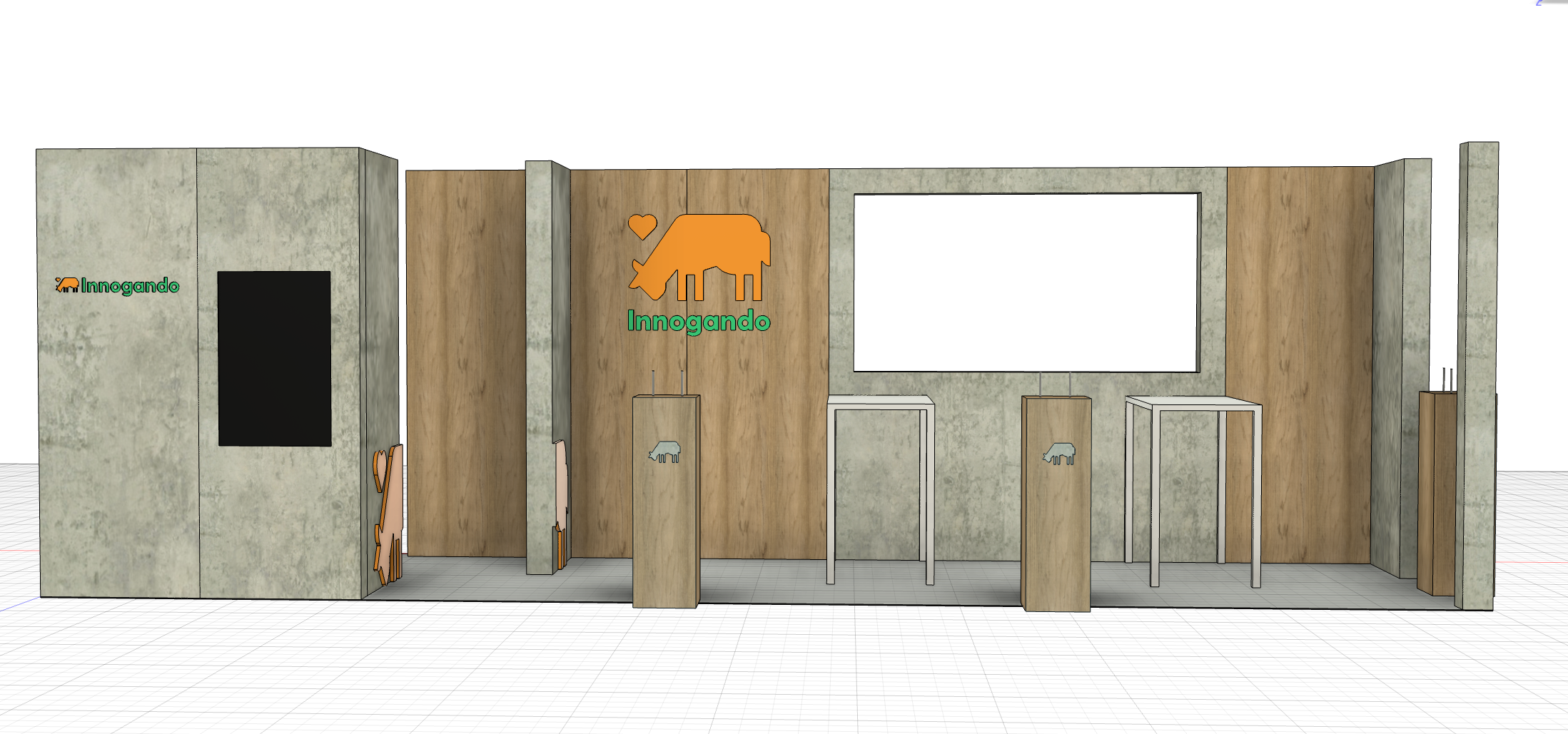 Visualización de un espacio interior con paredes de concreto y madera, exhibiendo logotipos de animales y el texto 'Innogando' en varios lugares, además de mobiliario sencillo y espacio para pantallas o exhibiciones.