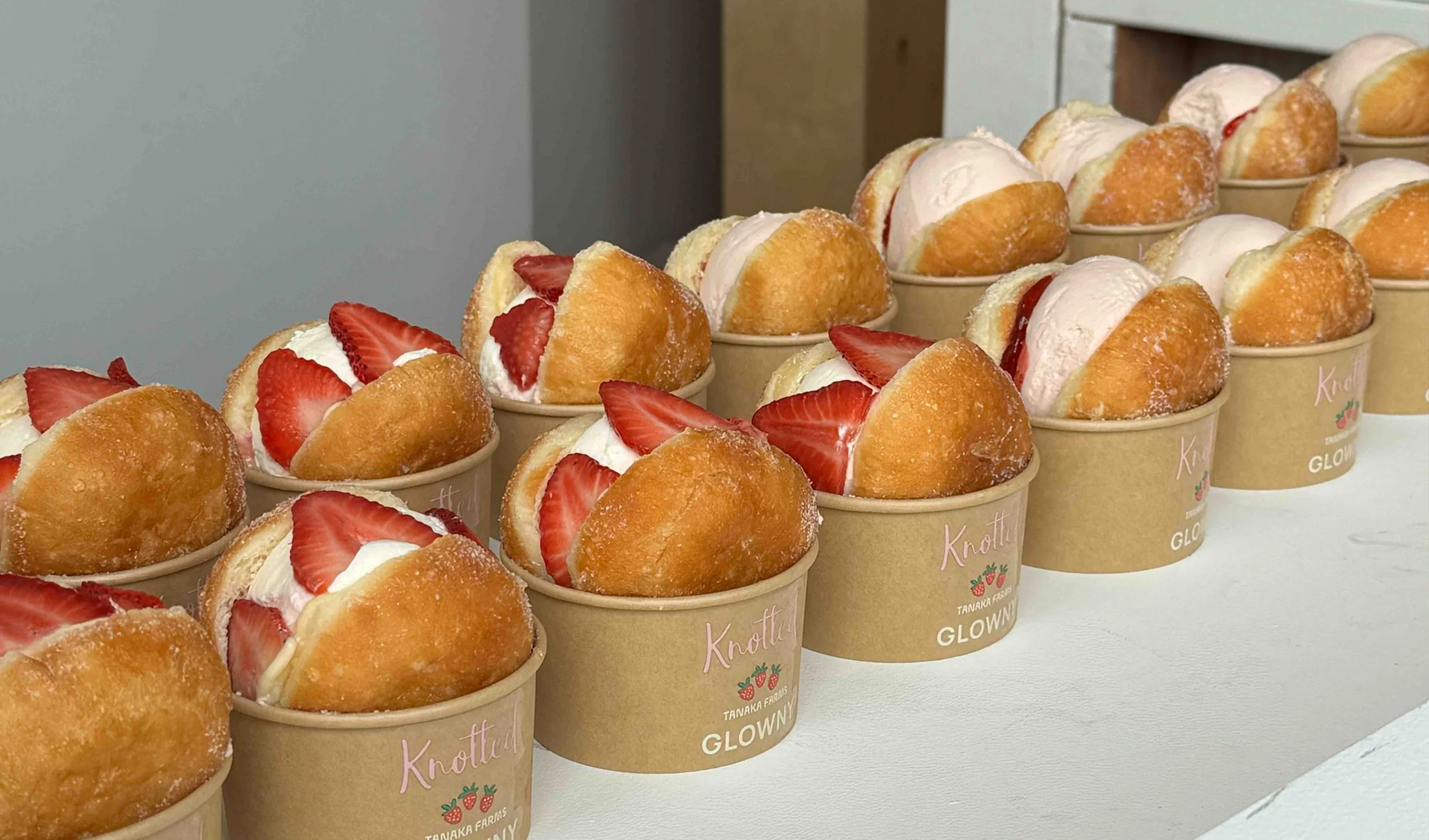 Strawberry cream donuts served in tan Knotted cups