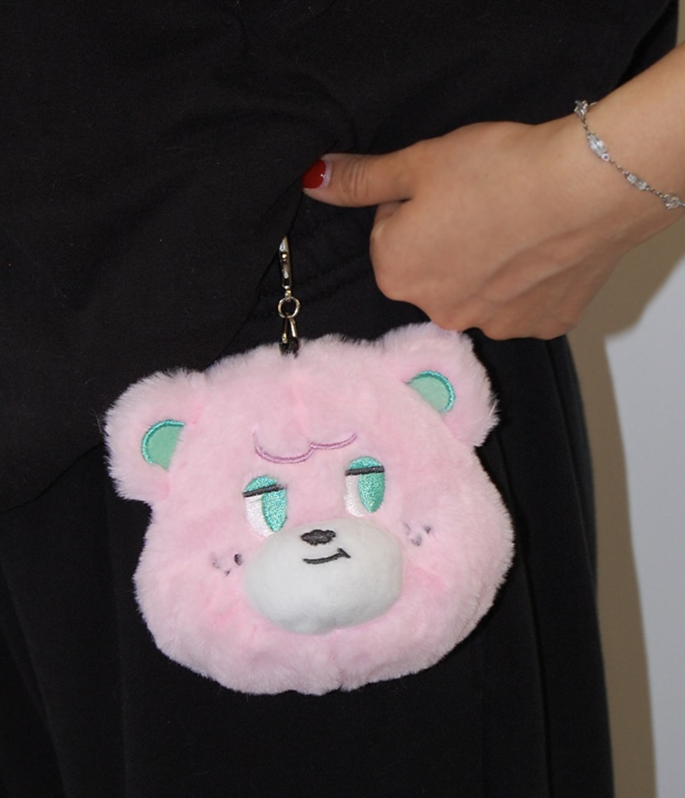 A pink Sugarbear Mini Pouch Keychain, a critical part of Cafe Knotted’s new in-store accessory launch.