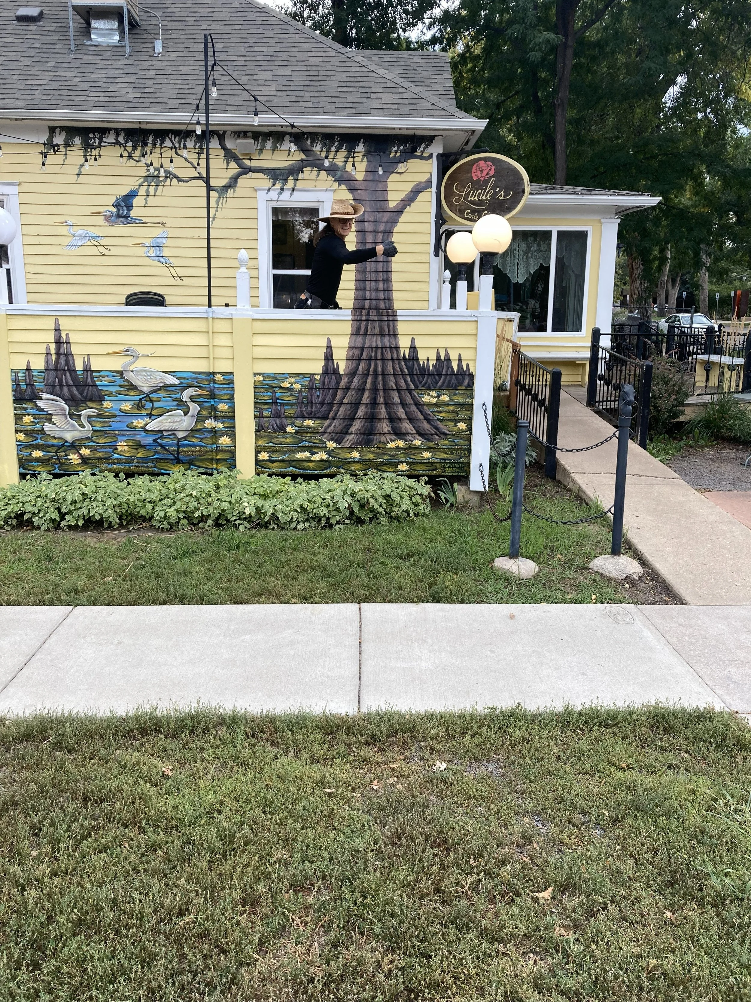 Lucile's sign, 2023, exterior acrylic paint on wood, located in Old Town Fort Collins