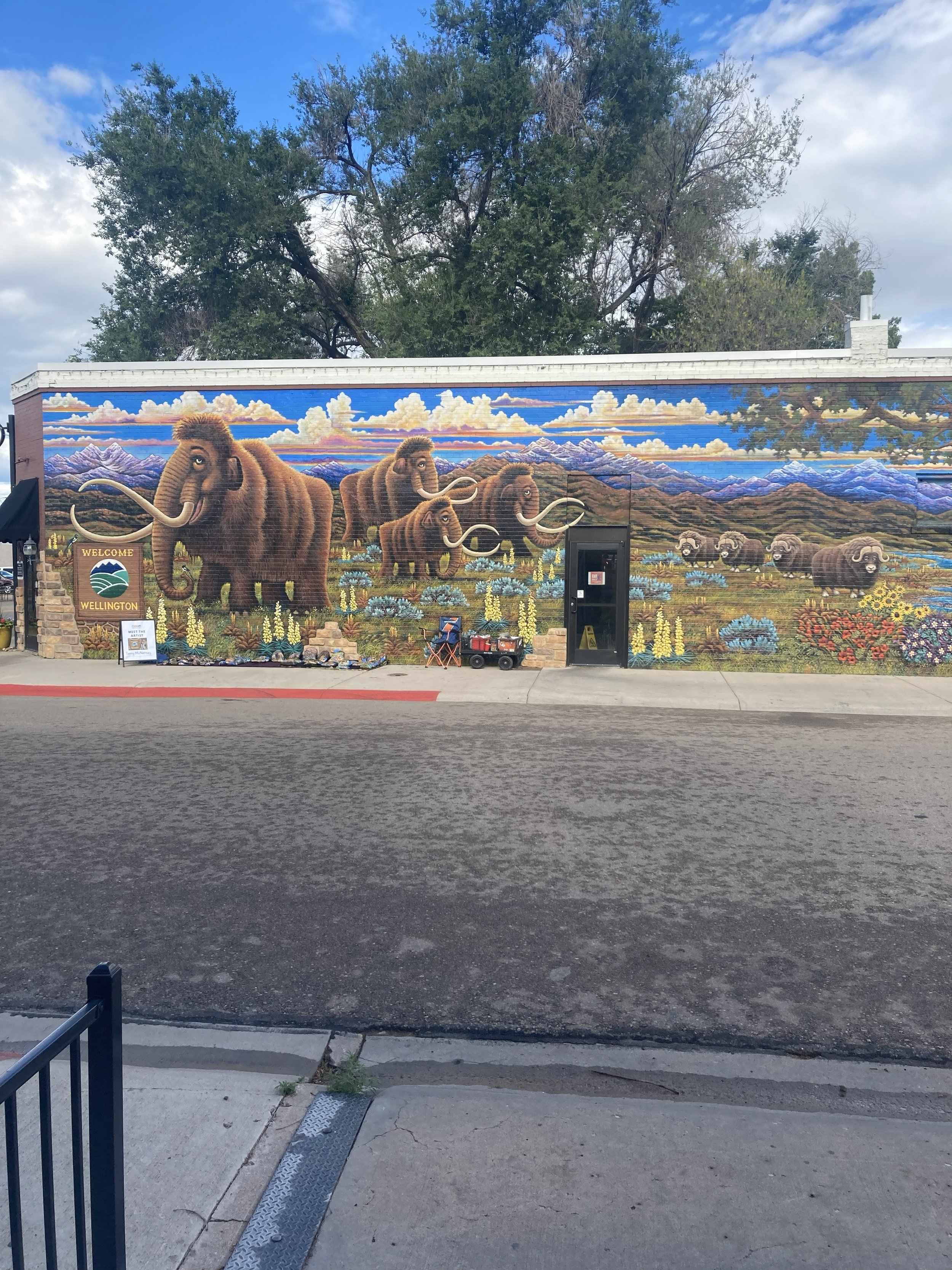Welly at Wellington Grill, 2025, exterior paint on brick, full mural size 18' x 60', located in Wellington county, commissioned by City of Wellington