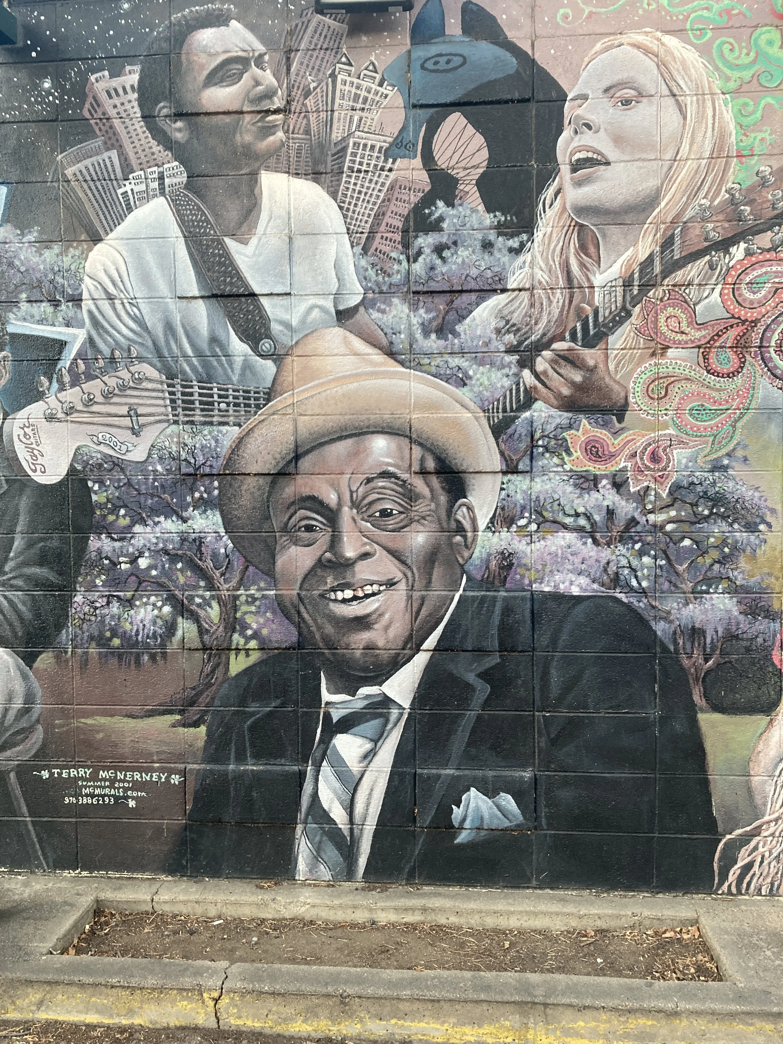 Detail Willie Dixon, 2016, exterior paint on cinder block, full mural size 12' x 60', located at Rockin Robbins on College Ave, commissioned by Rockin Robbins