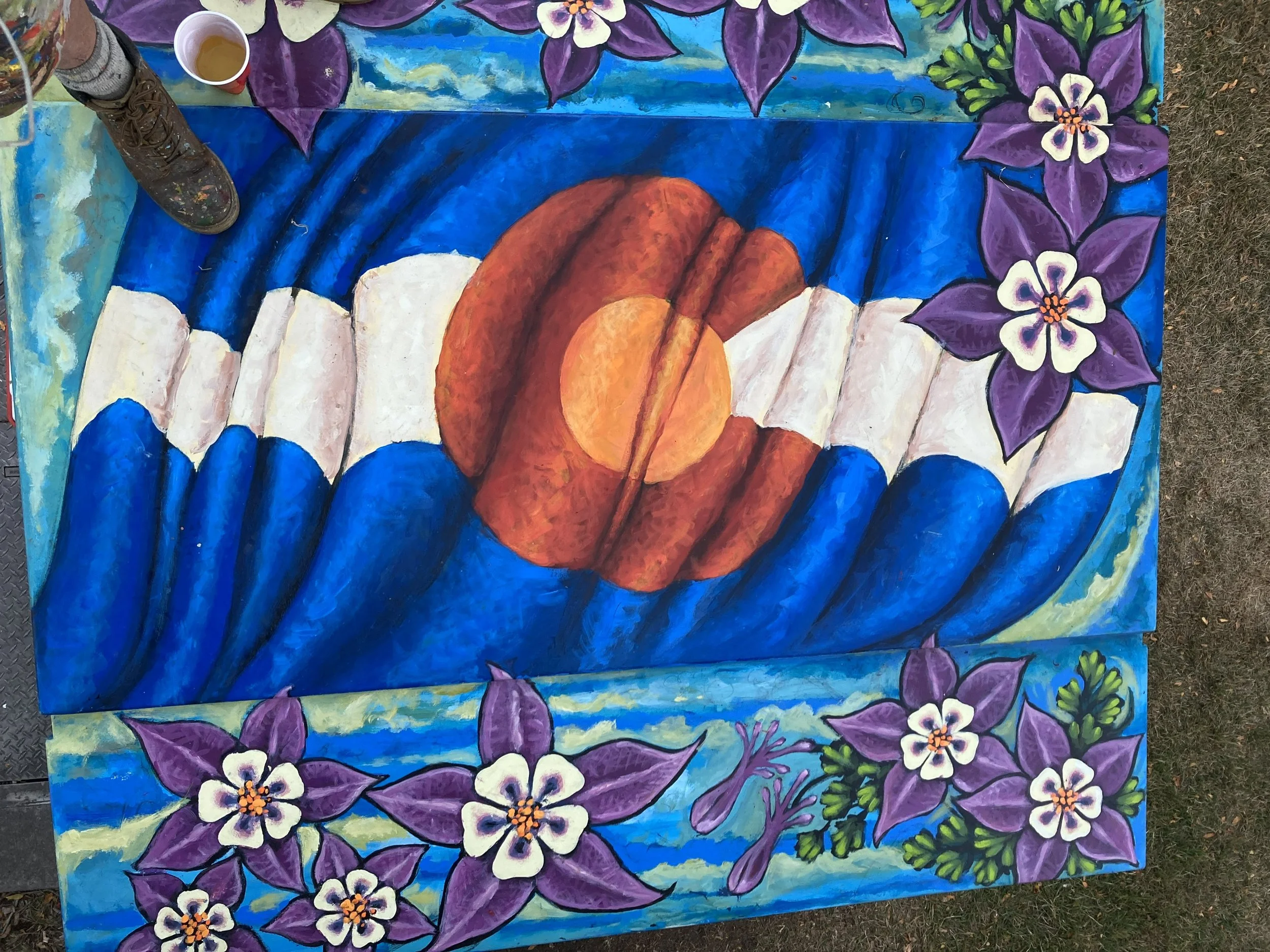 Detail Top View of Gone Fishing, 2024, exterior paint on metal transformer, painted all 4 sides and top 5' x 6',  located on the CSU campus, commissioned by the City of Fort Collins Art in Public Places