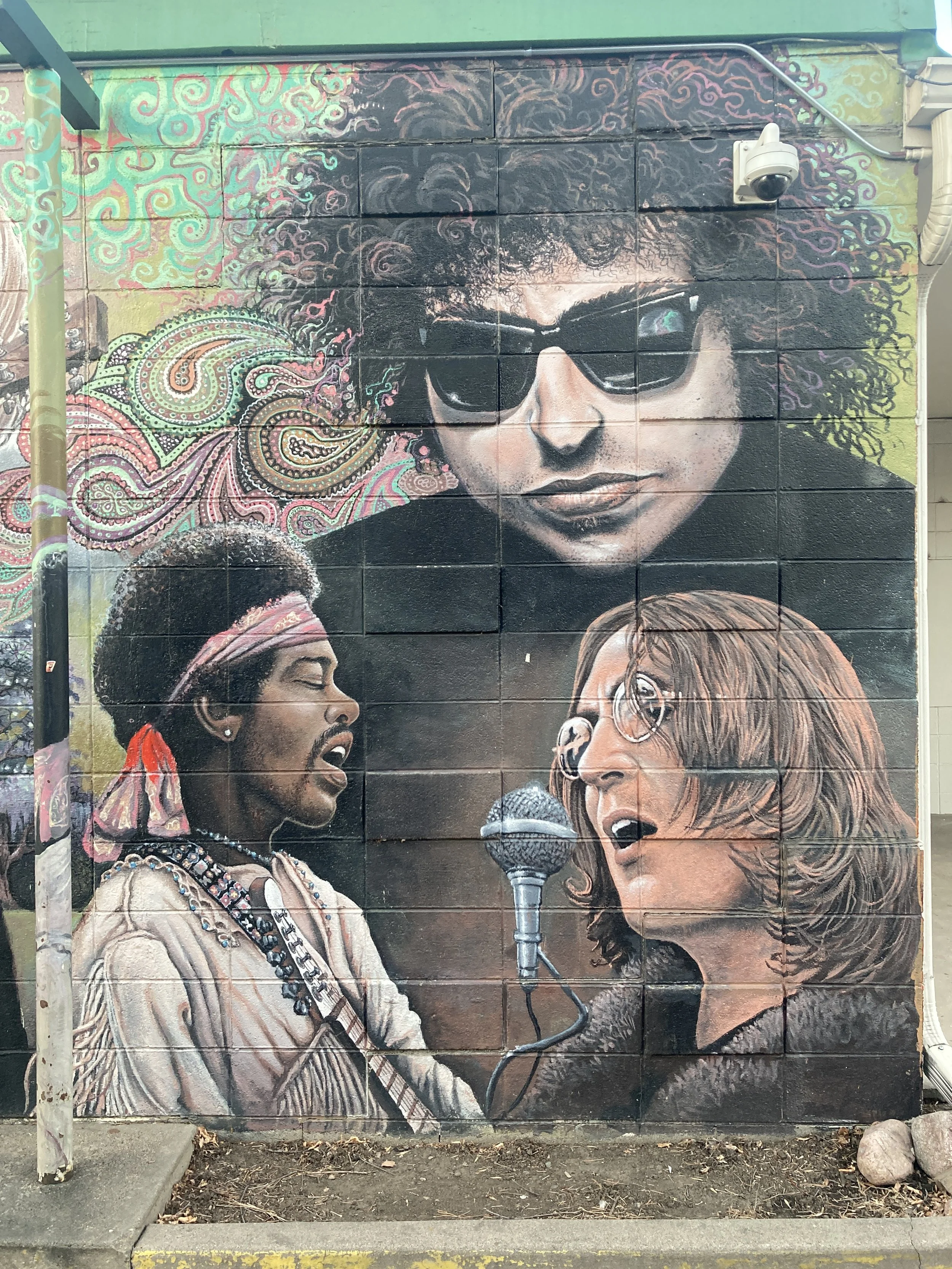 Dylan, Jim and John, 2001, exterior paint on cinder block, 12' x 60', located at Rockin Robbins on College Ave, commissioned by Rockin Robbins