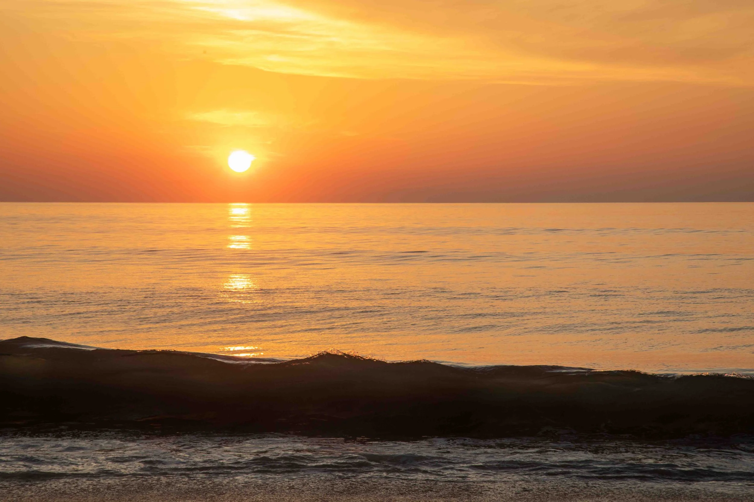 1:10 Orange Glass Wavebreak at Sunrise.jpg