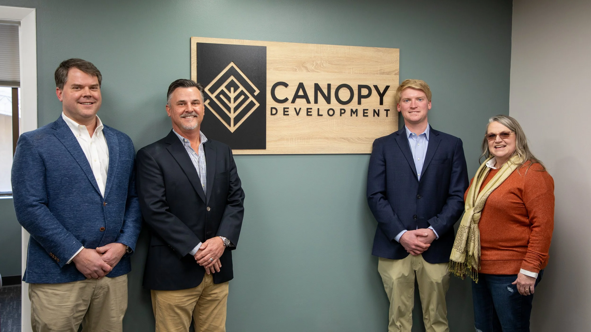 Group with sign2.jpg