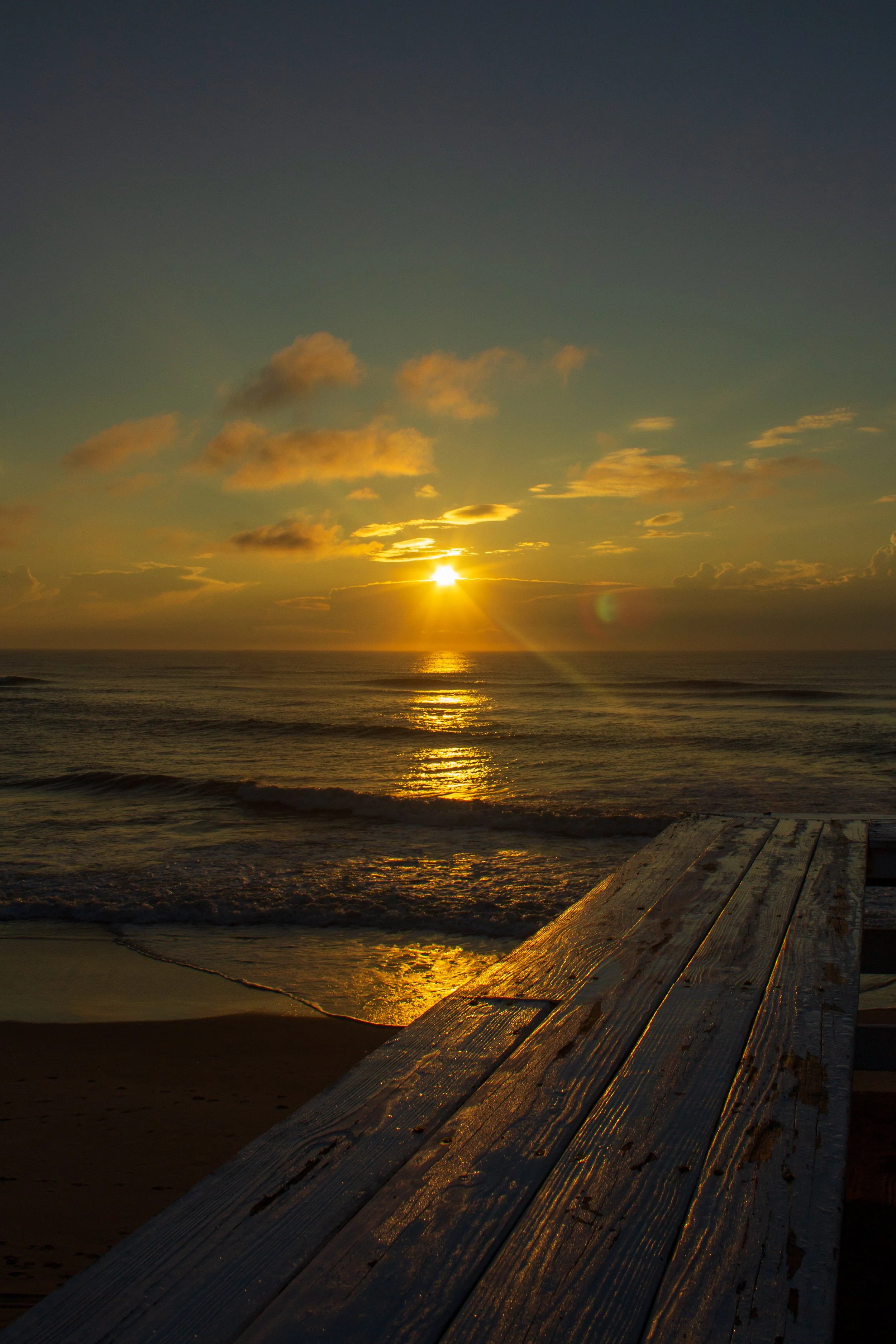 1:1 Sunrise Flare Reflection off Rodanthe Pier (Portrait).jpg
